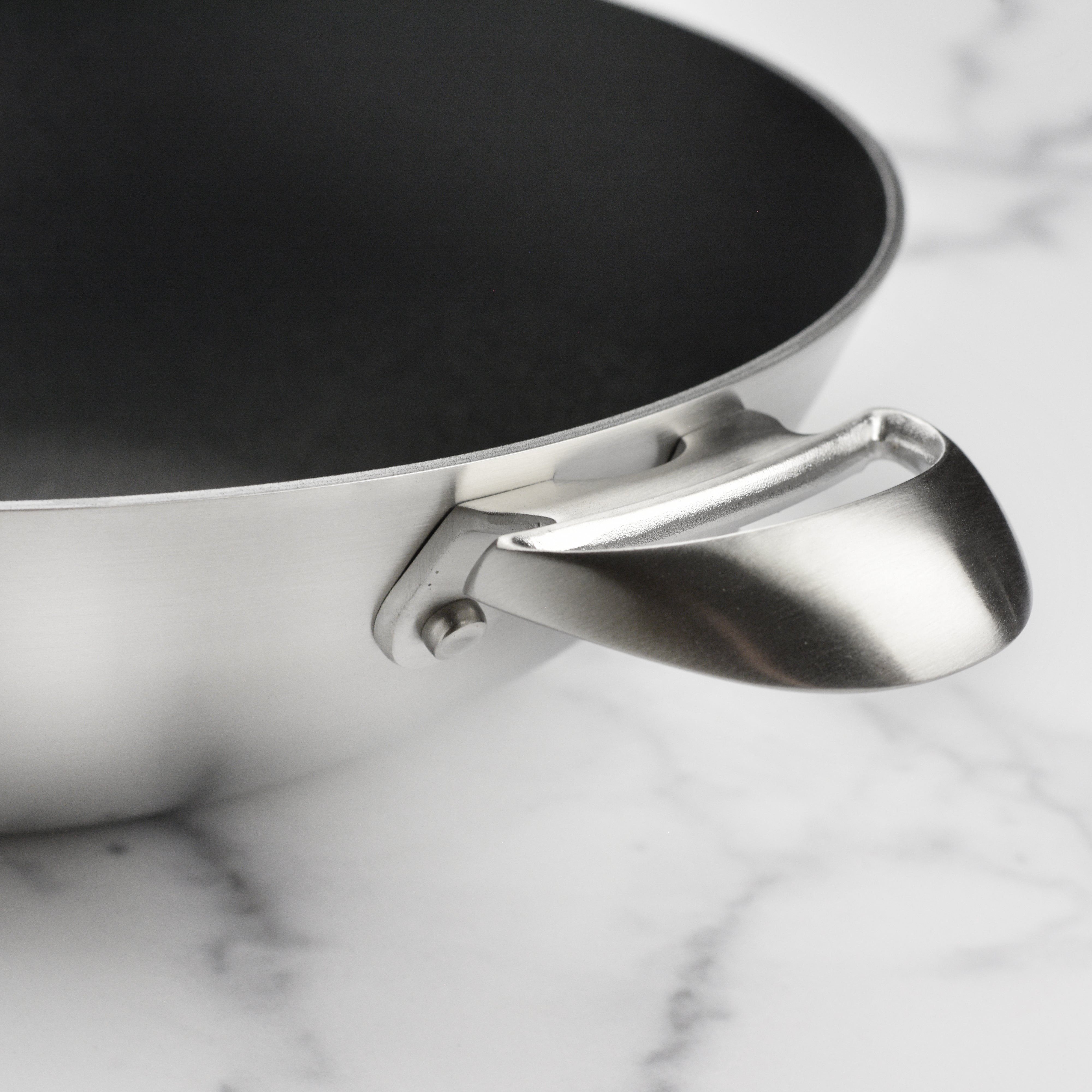 Castpan CX+ wok from a top angle, showcasing its durable nonstick surface.