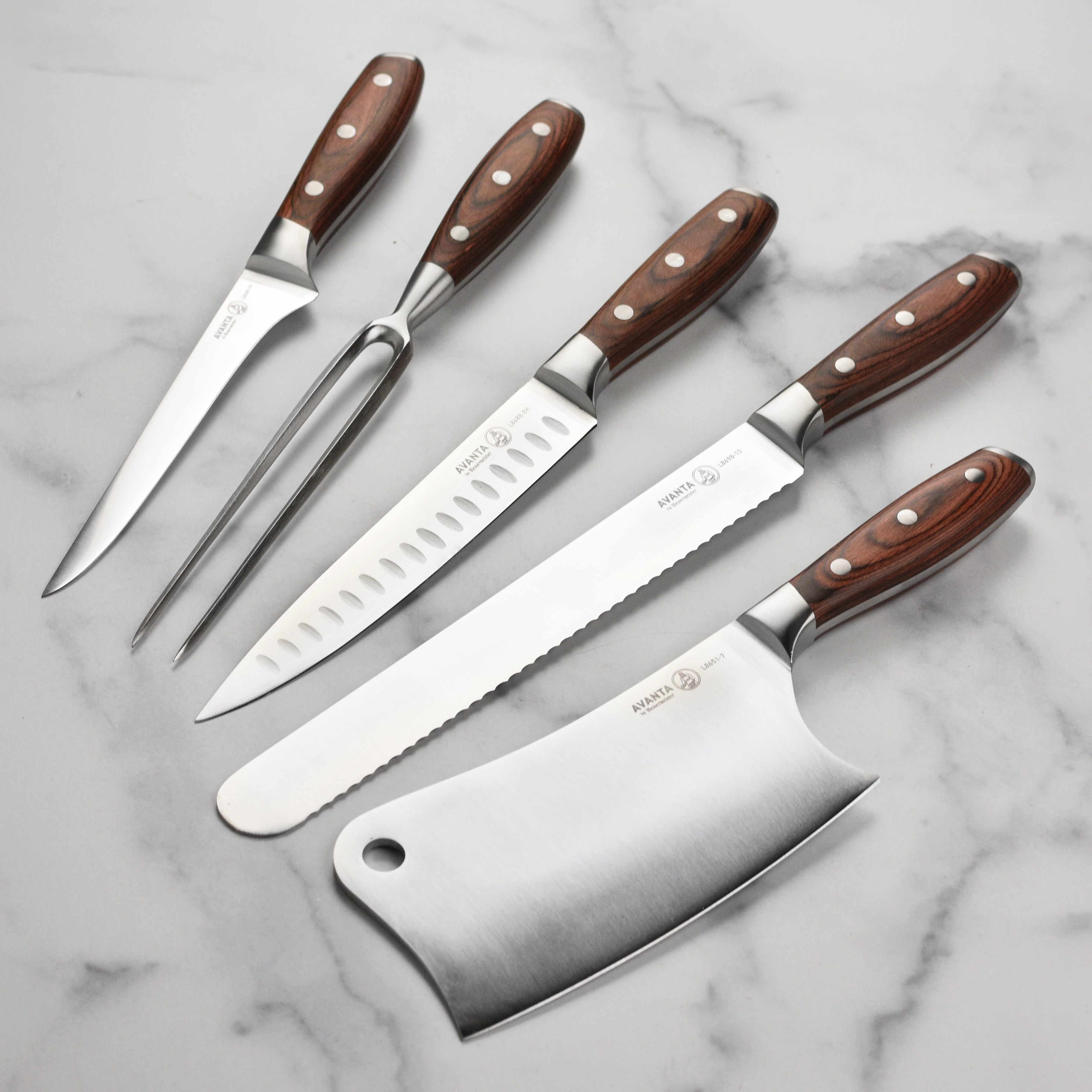 Close-up of the high carbon stainless steel blade from the BBQ knife set, showcasing its sharp edge and craftsmanship.
