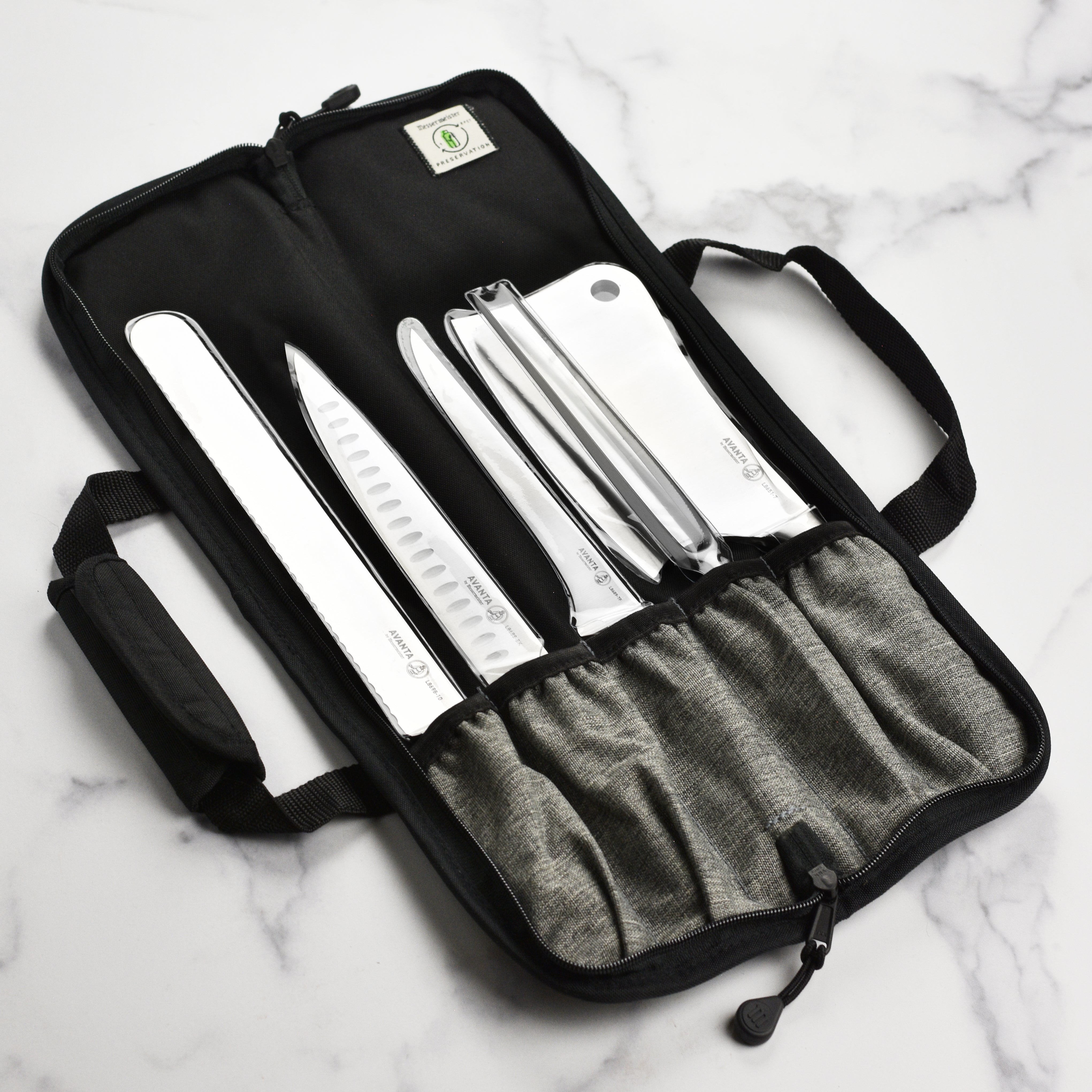All six knives from the BBQ knife set arranged neatly, emphasizing their elegant design and functional handles.