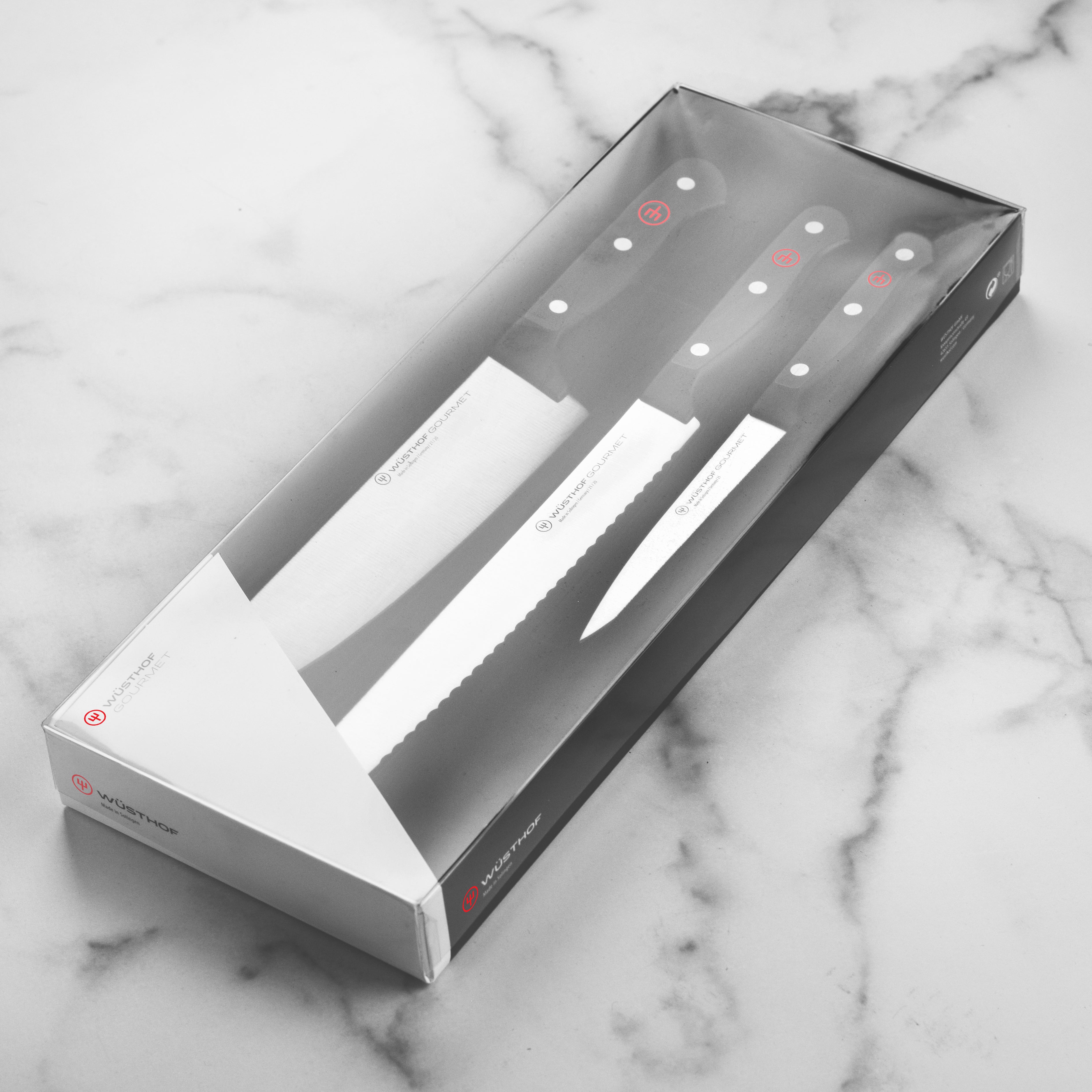 Wusthof Gourmet knife set arranged neatly in a kitchen drawer, emphasizing space-efficient storage.