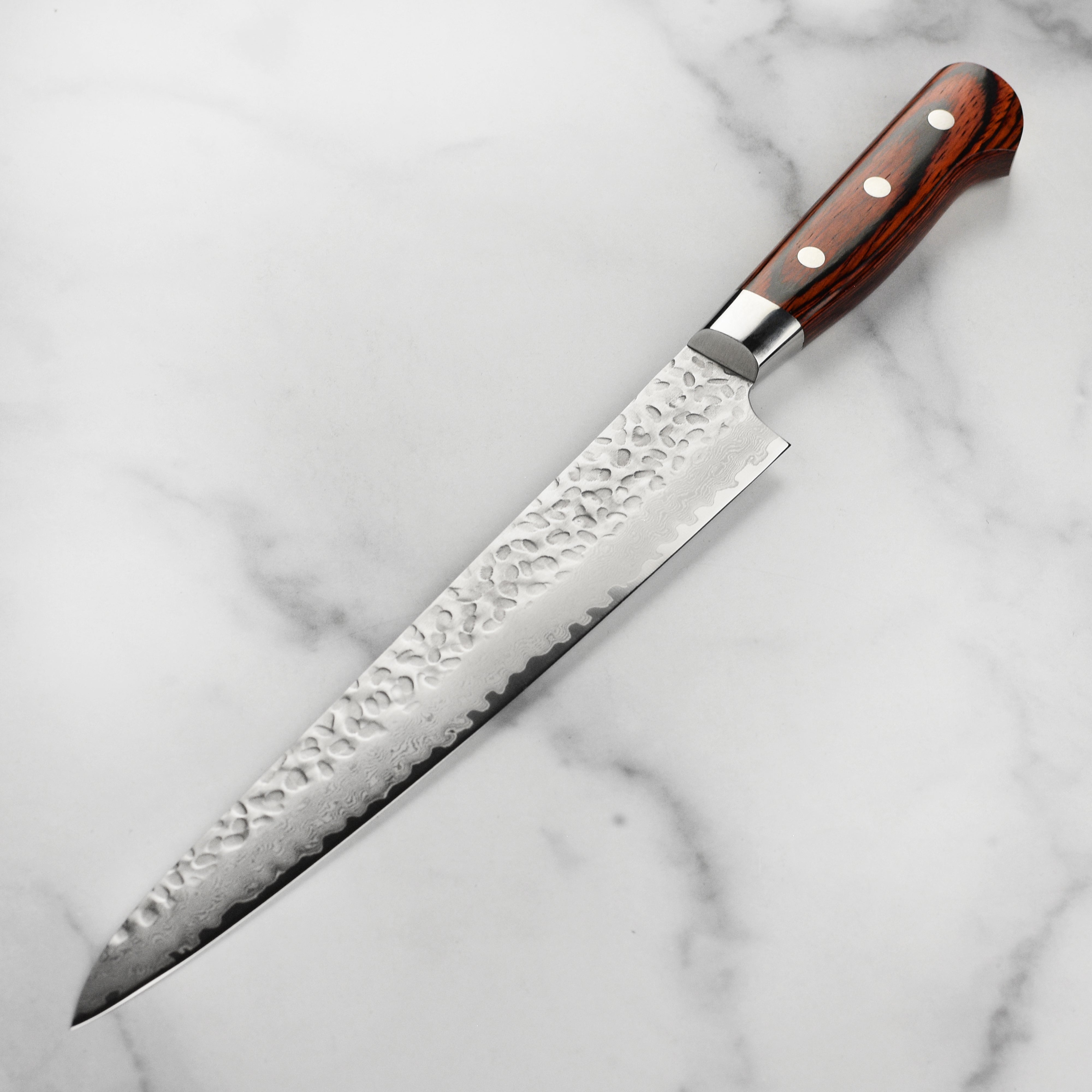 Side view of Takayuki Sujihiki knife, highlighting the 33-layer Damascus steel construction.