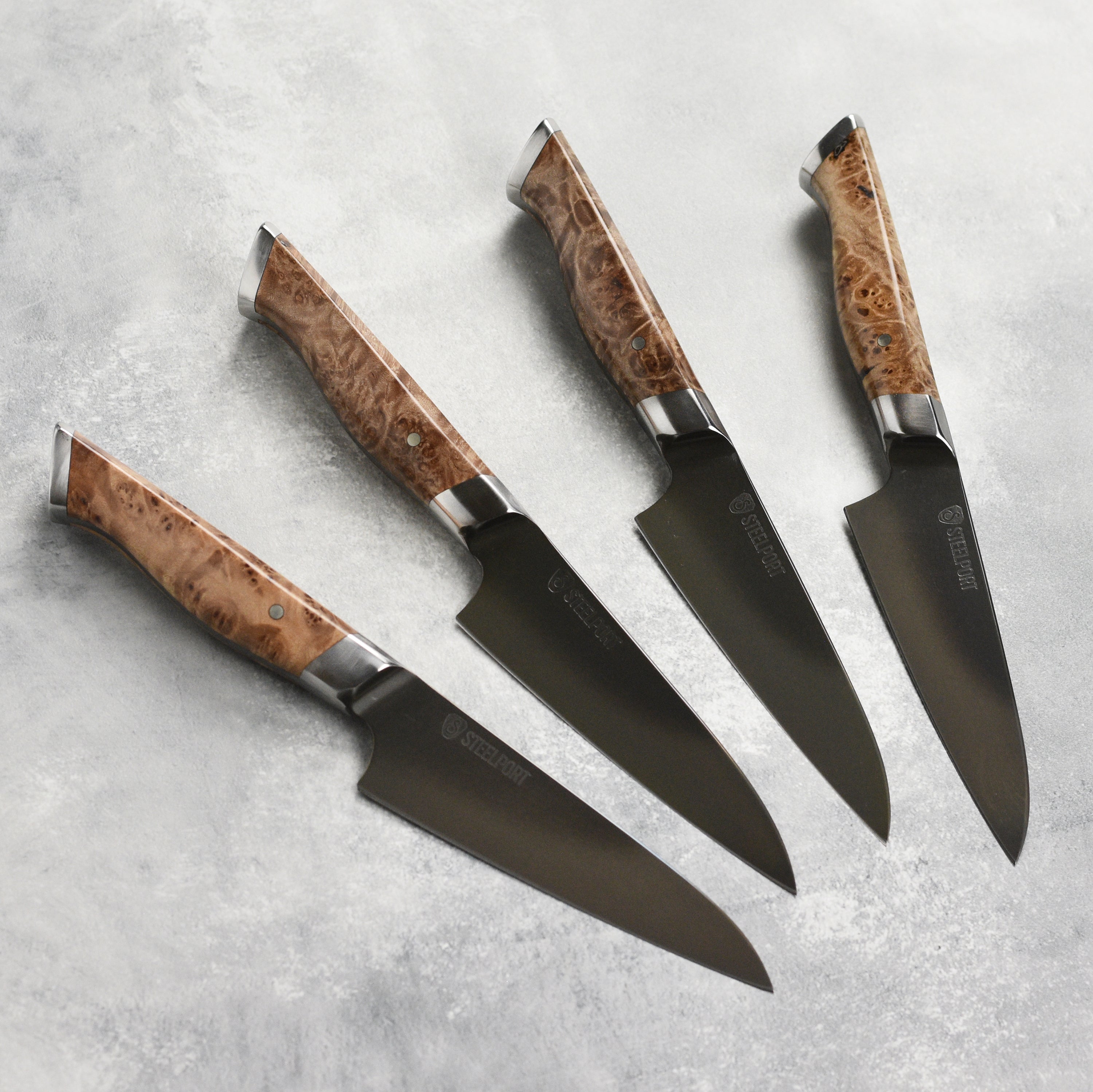 Close-up of the blade and handle of the Steelport carbon steel steak knife.