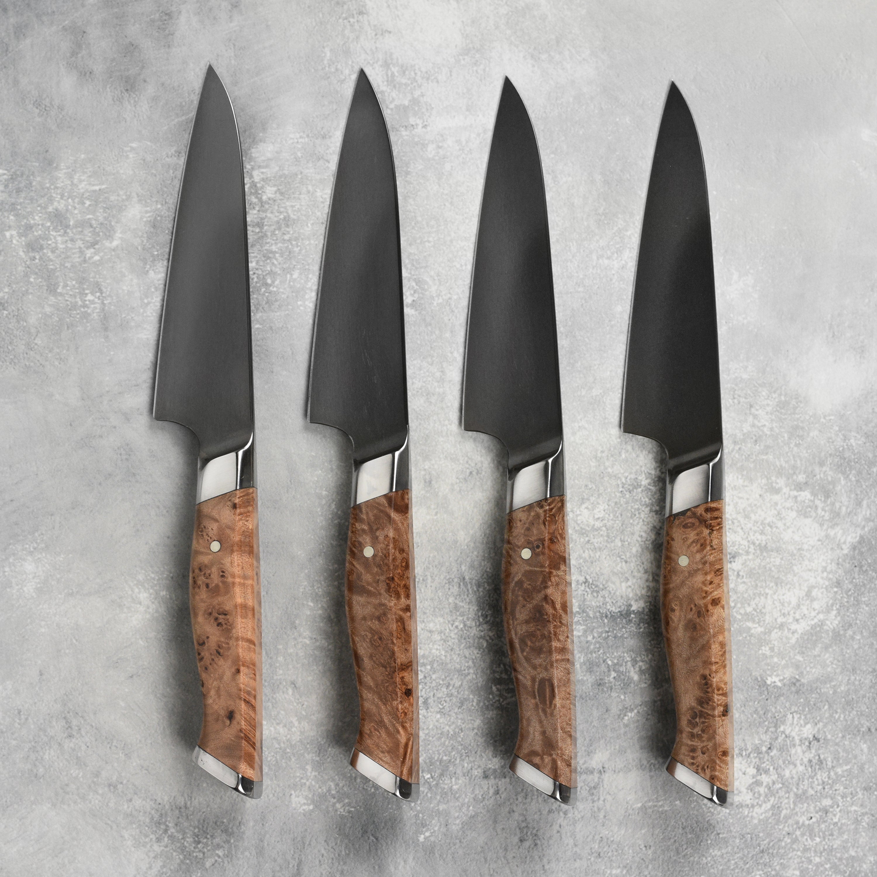 Steelport steak knives showcased with a gourmet meal.