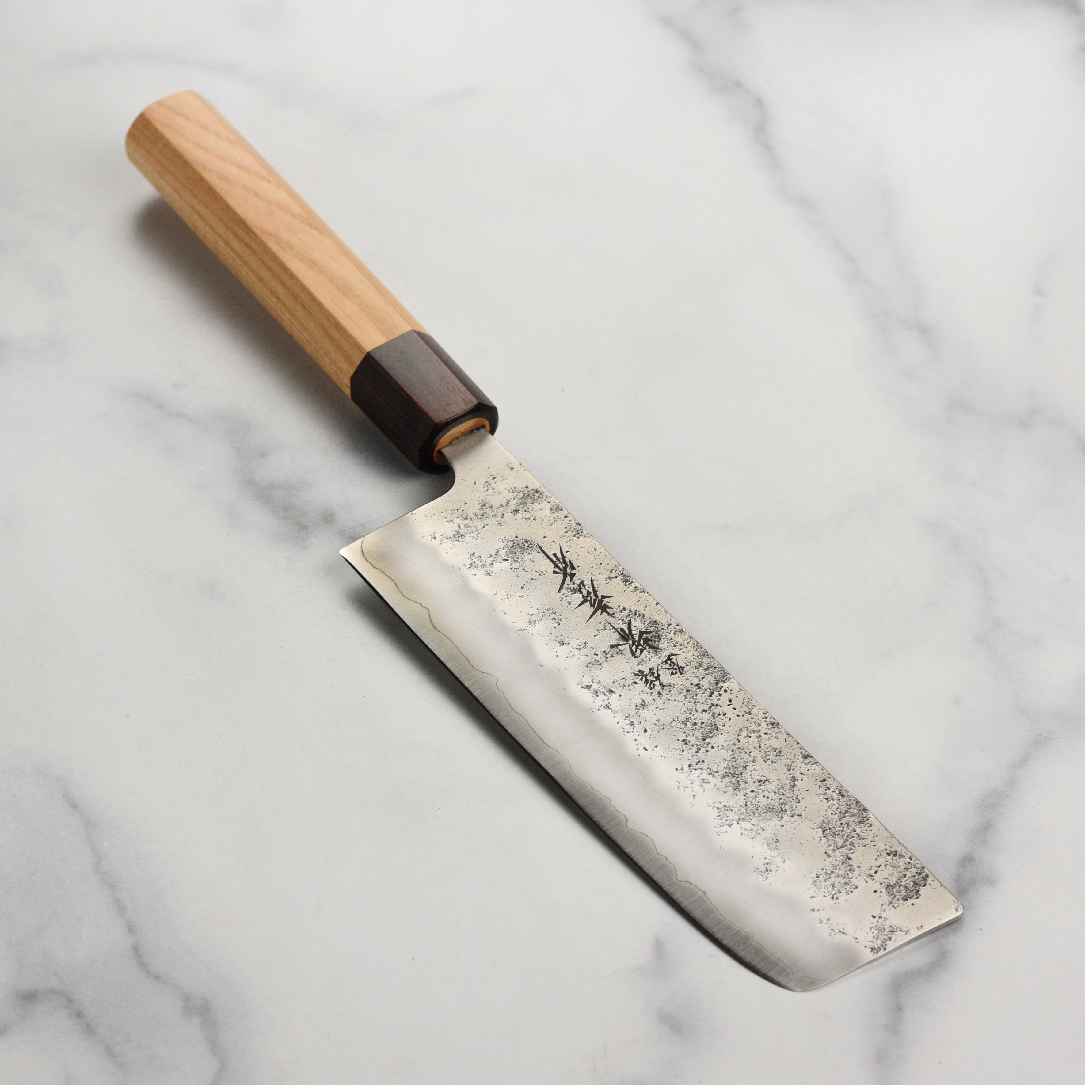 Sakai Masterpiece Nakiri Knife with Ginsan blade and Zelkova wood handle from the side
