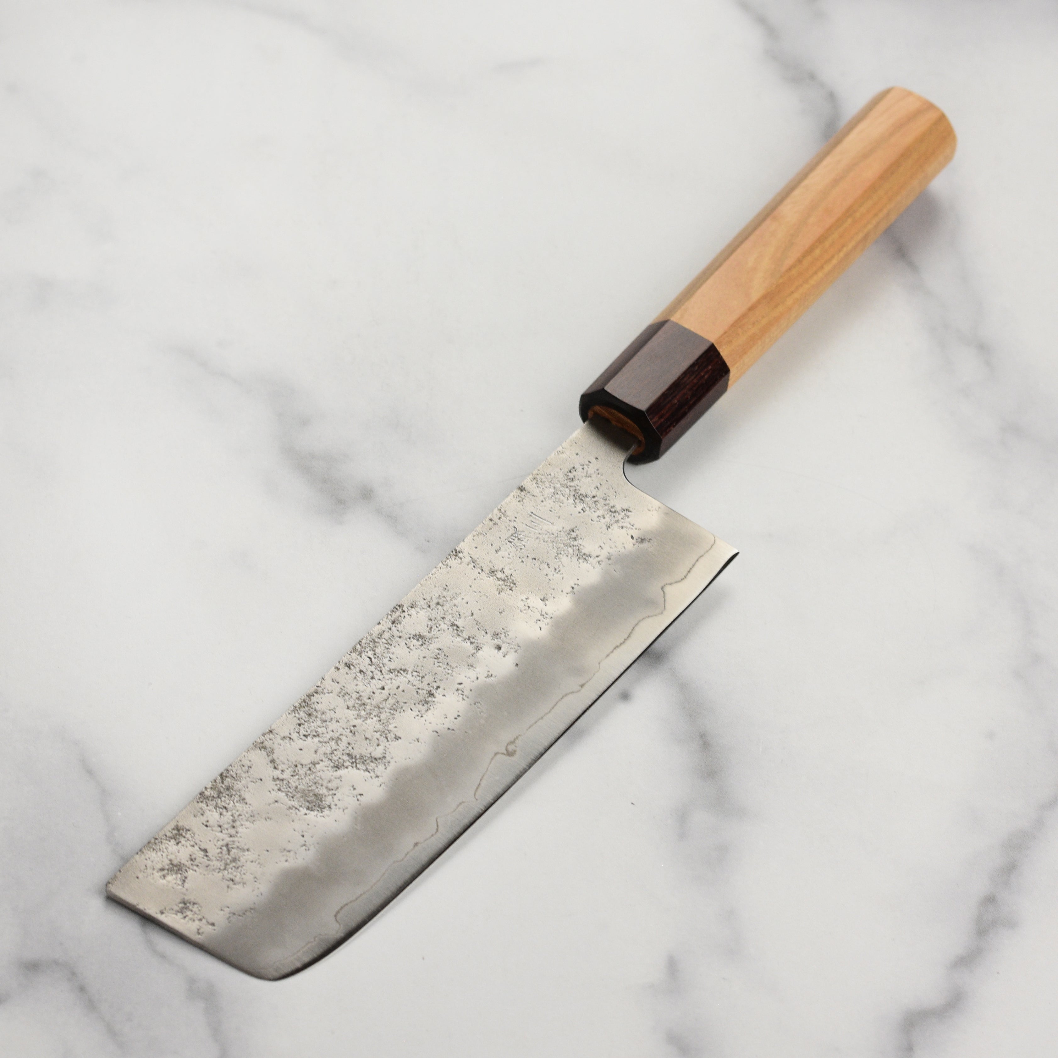 Close-up of the nashiji finish on the blade of the Sakai Masterpiece Nakiri Knife