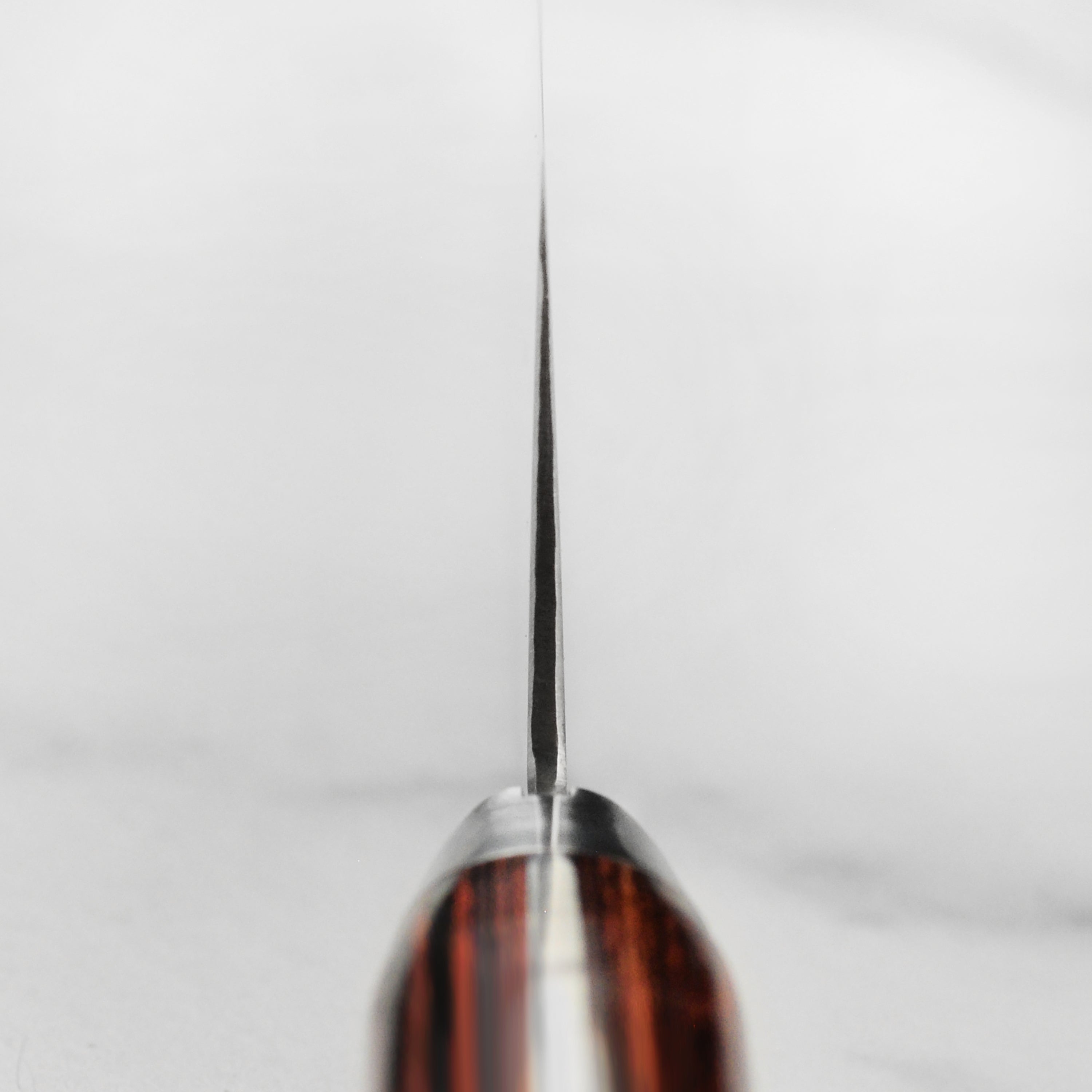 Japanese Nakiri knife with Pakkawood handle for precise vegetable slicing