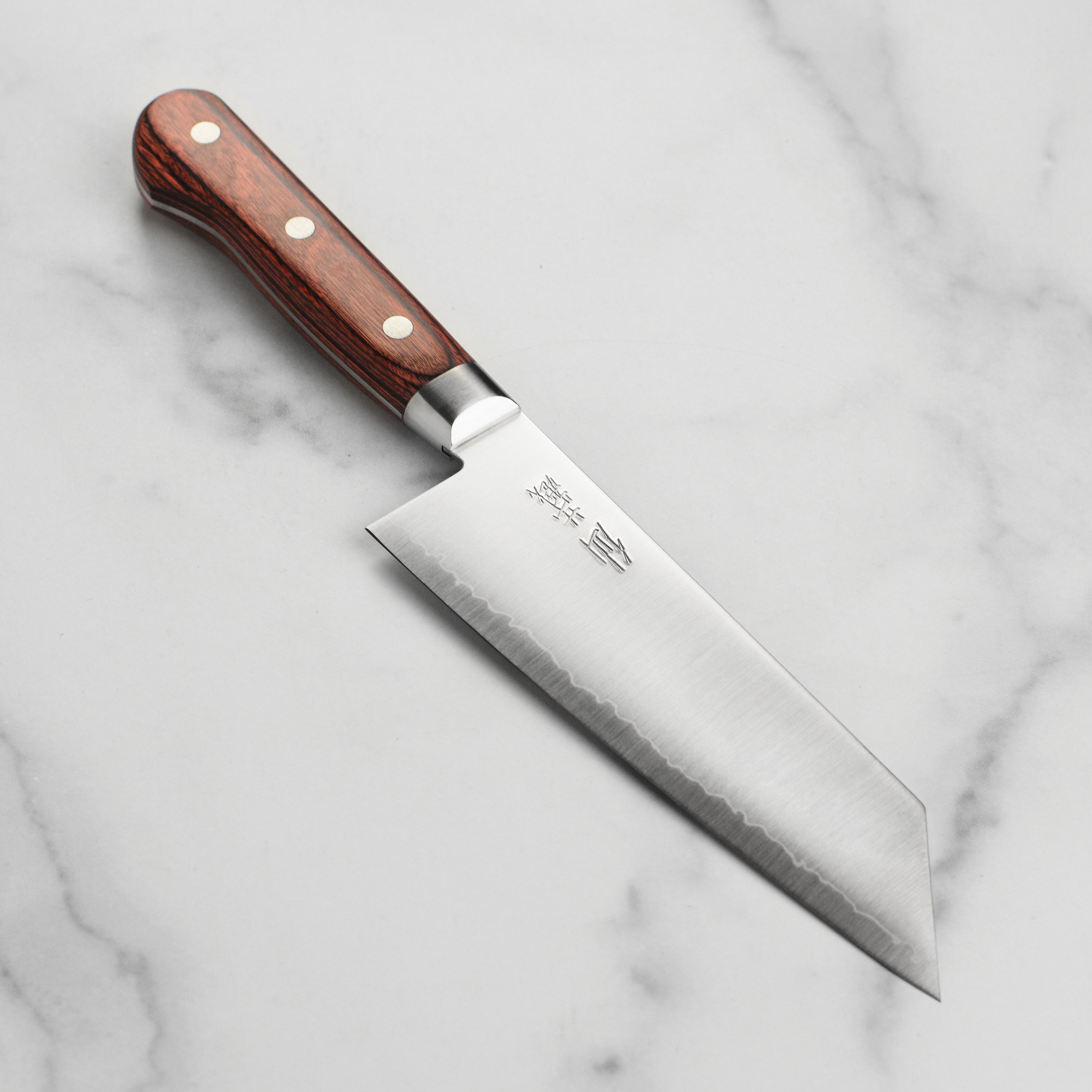 Japanese Bunka knife with high-carbon AUS10 steel blade and Pakkawood handle, ideal for precise slicing