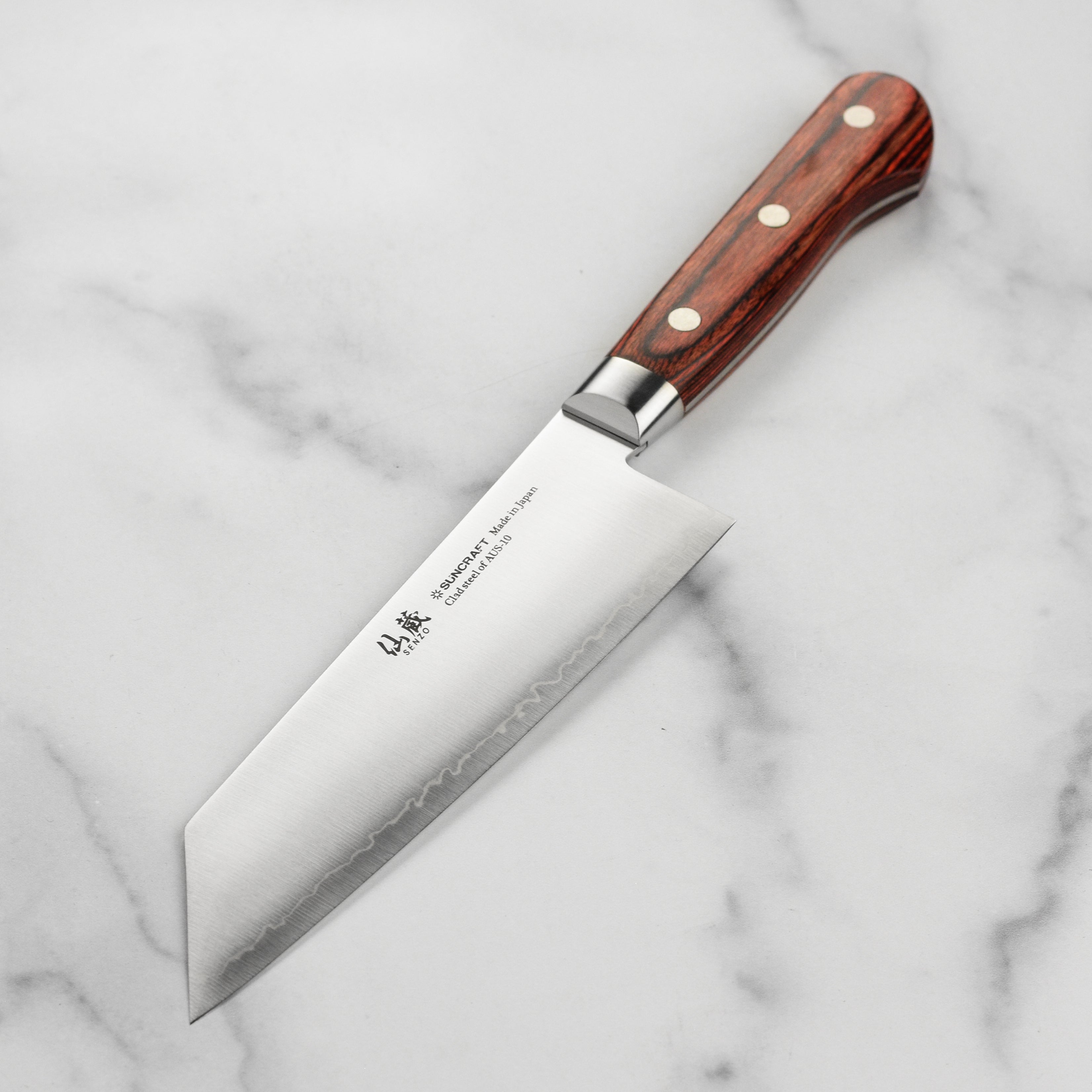 Top view of the Senzo Clad AUS10 6.5-inch Bunka Knife showcasing its craftsmanship and blade edge