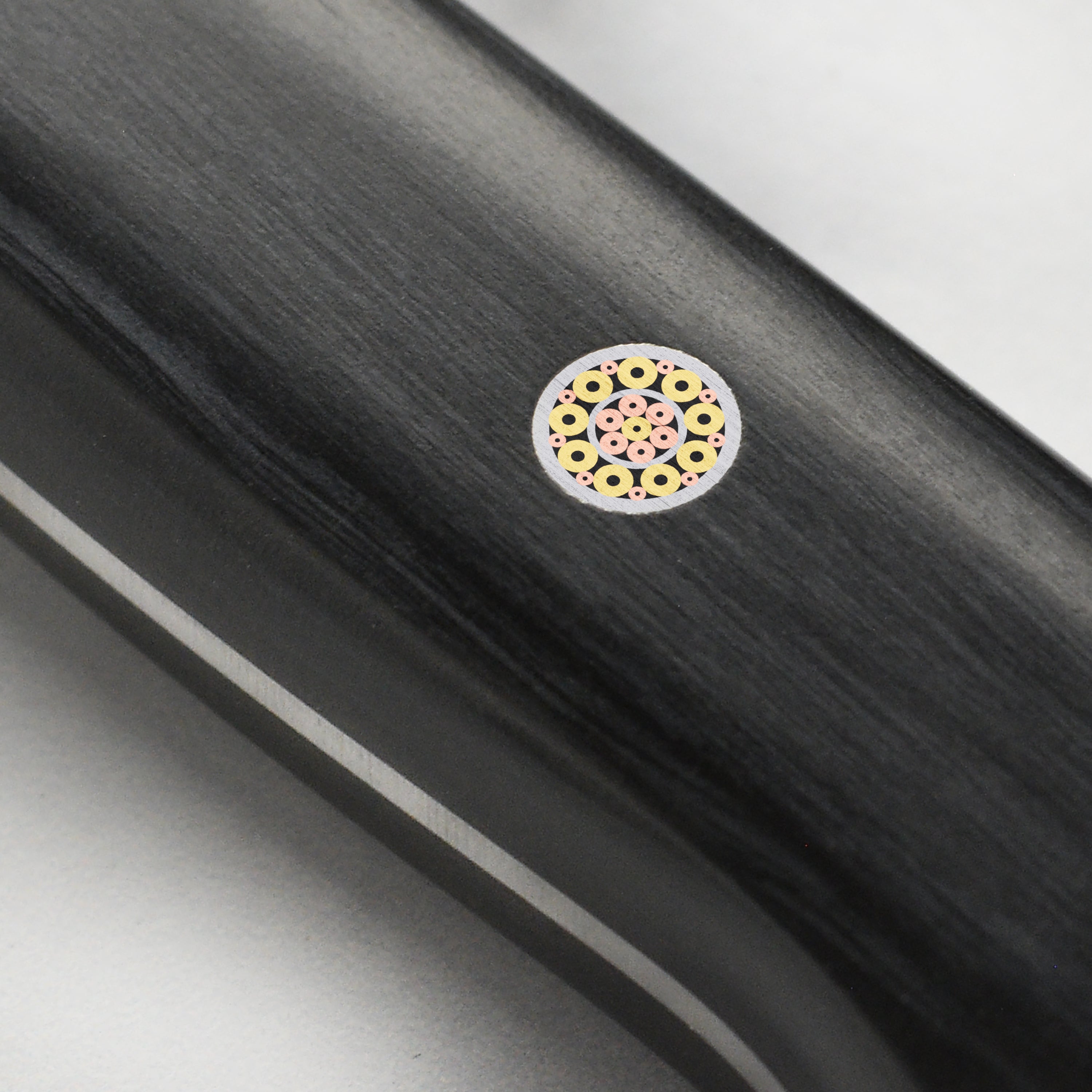 Chef using the Senzo Elite SG2 6.5-Inch Santoku Knife for precise vegetable slicing.