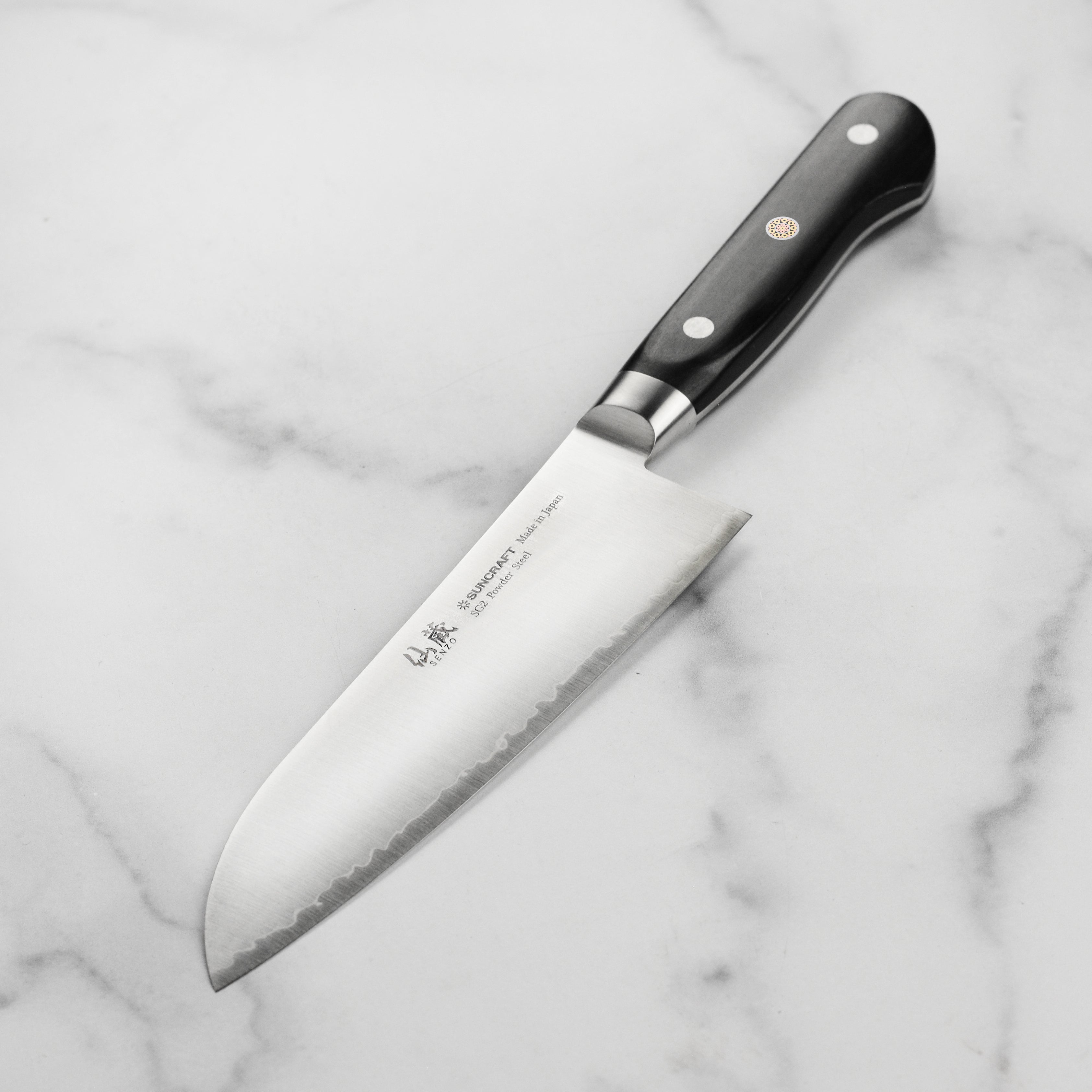 Close-up of the Senzo Elite SG2 Santoku Knife highlighting the craftsmanship and edge retention.