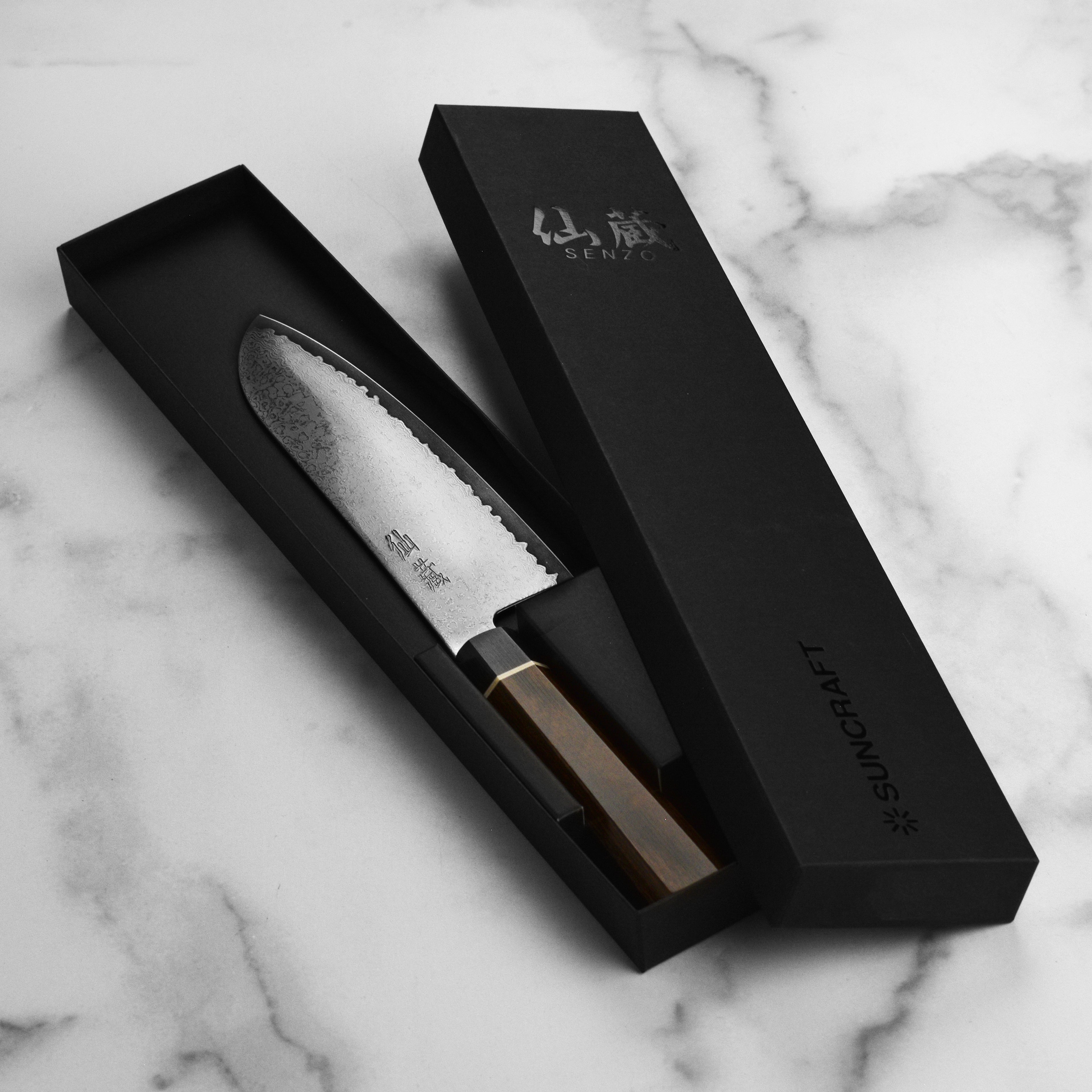 Suncraft Premium Santoku knife displayed in a kitchen setting, highlighting its use for cutting vegetables.