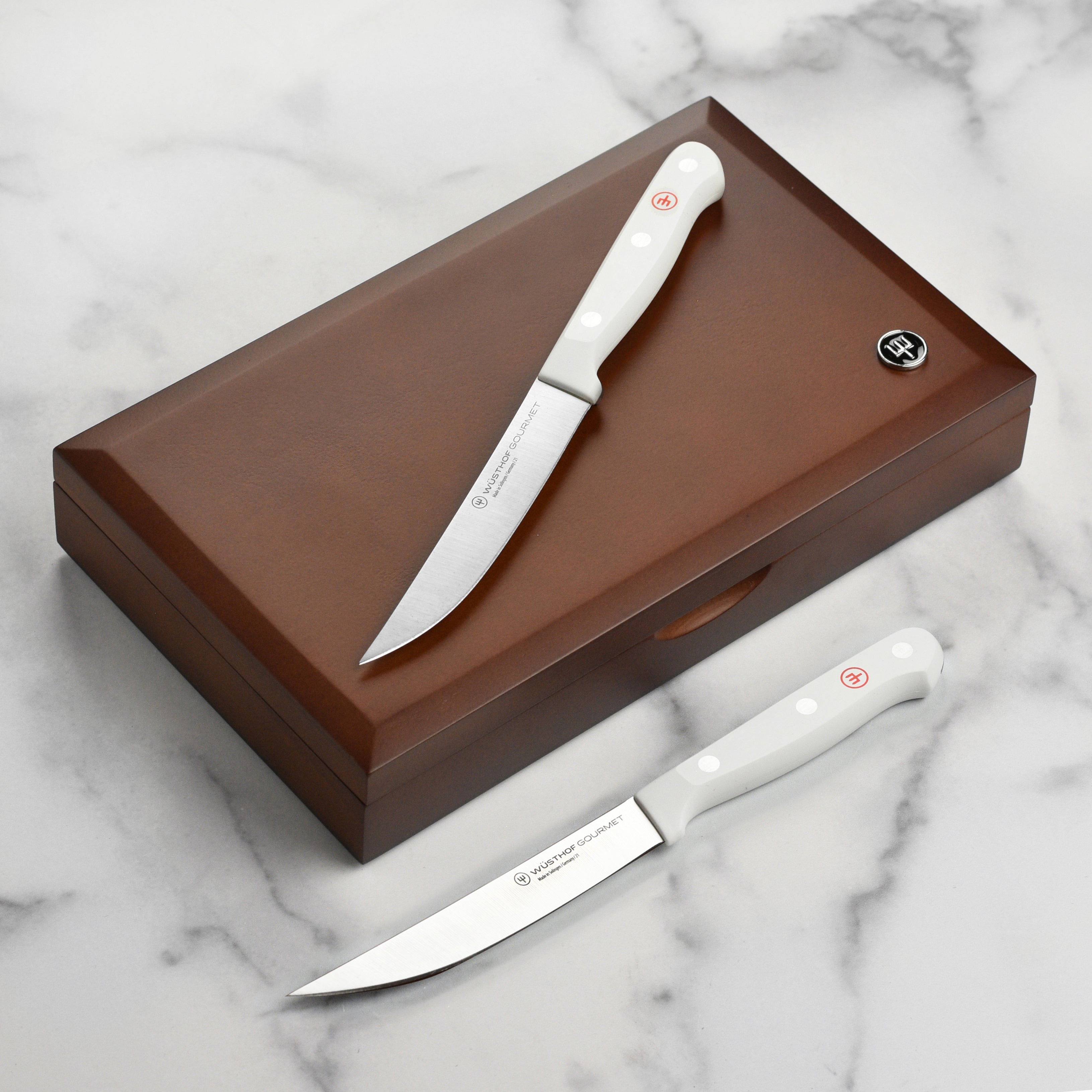 Close-up of Wusthof steak knives highlighting sharp blades and sturdy handles