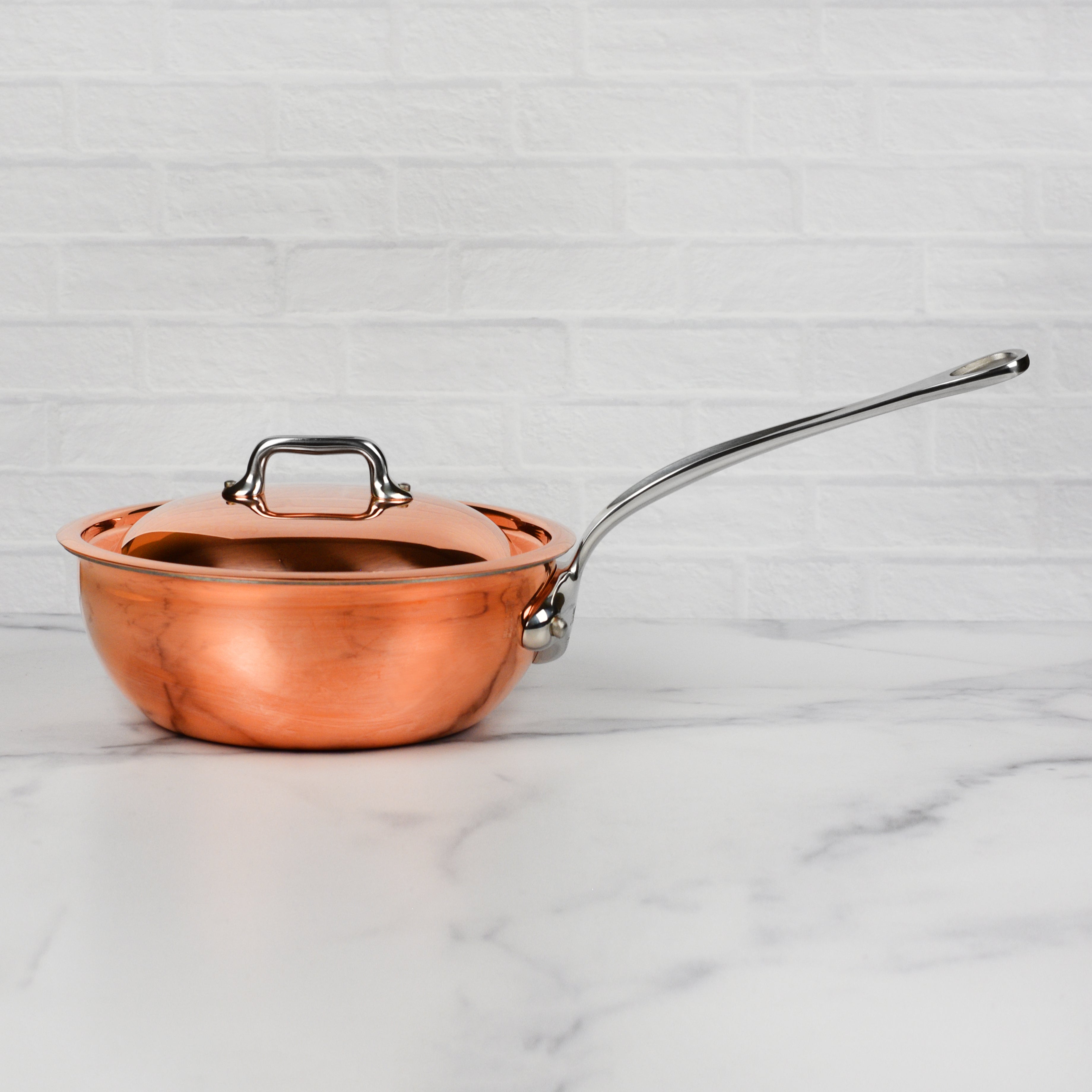 Side profile of the high-end copper pan for cooking sauces, highlighting its multi-layer copper and stainless steel construction