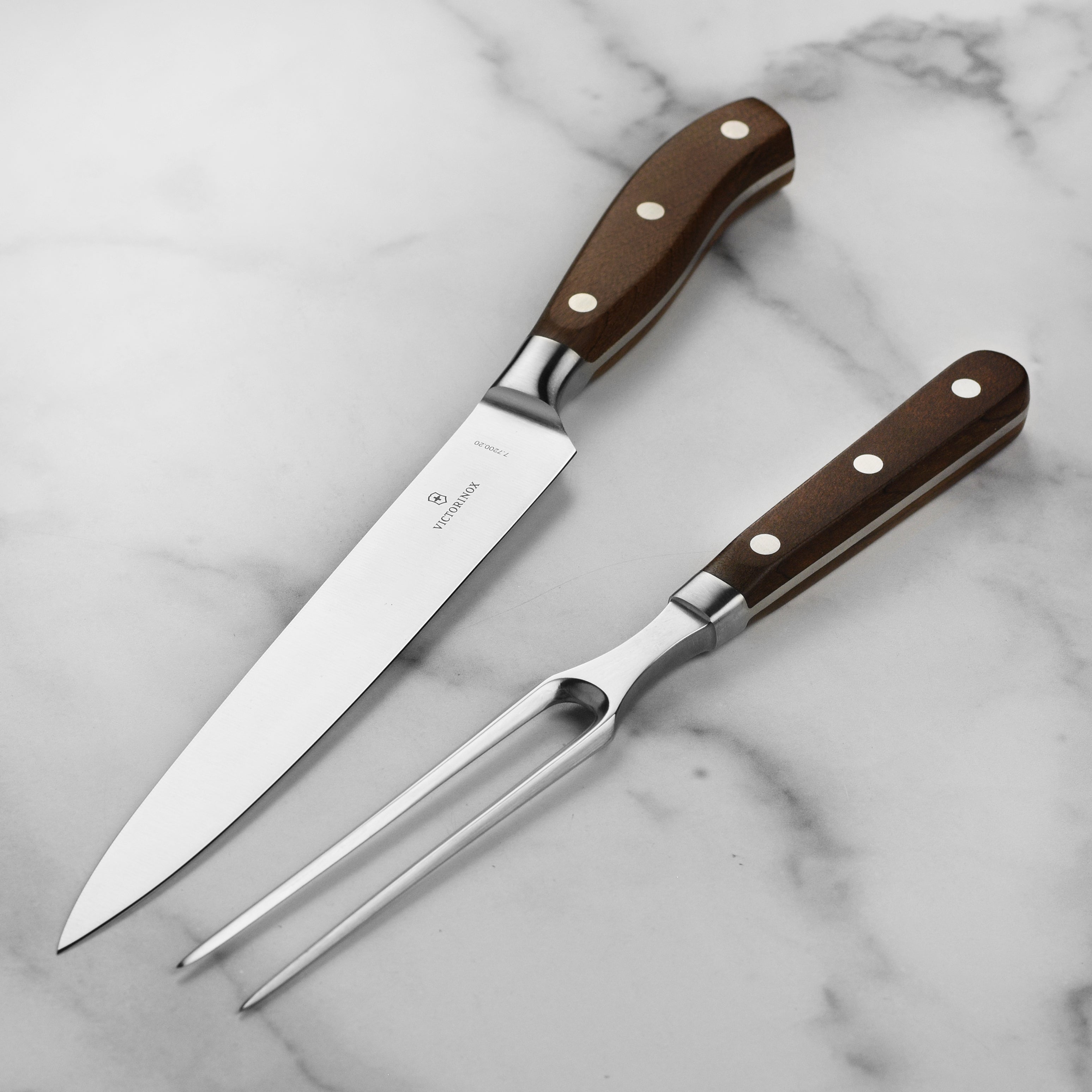 High-quality Victorinox carving knife set with ergonomic handle.