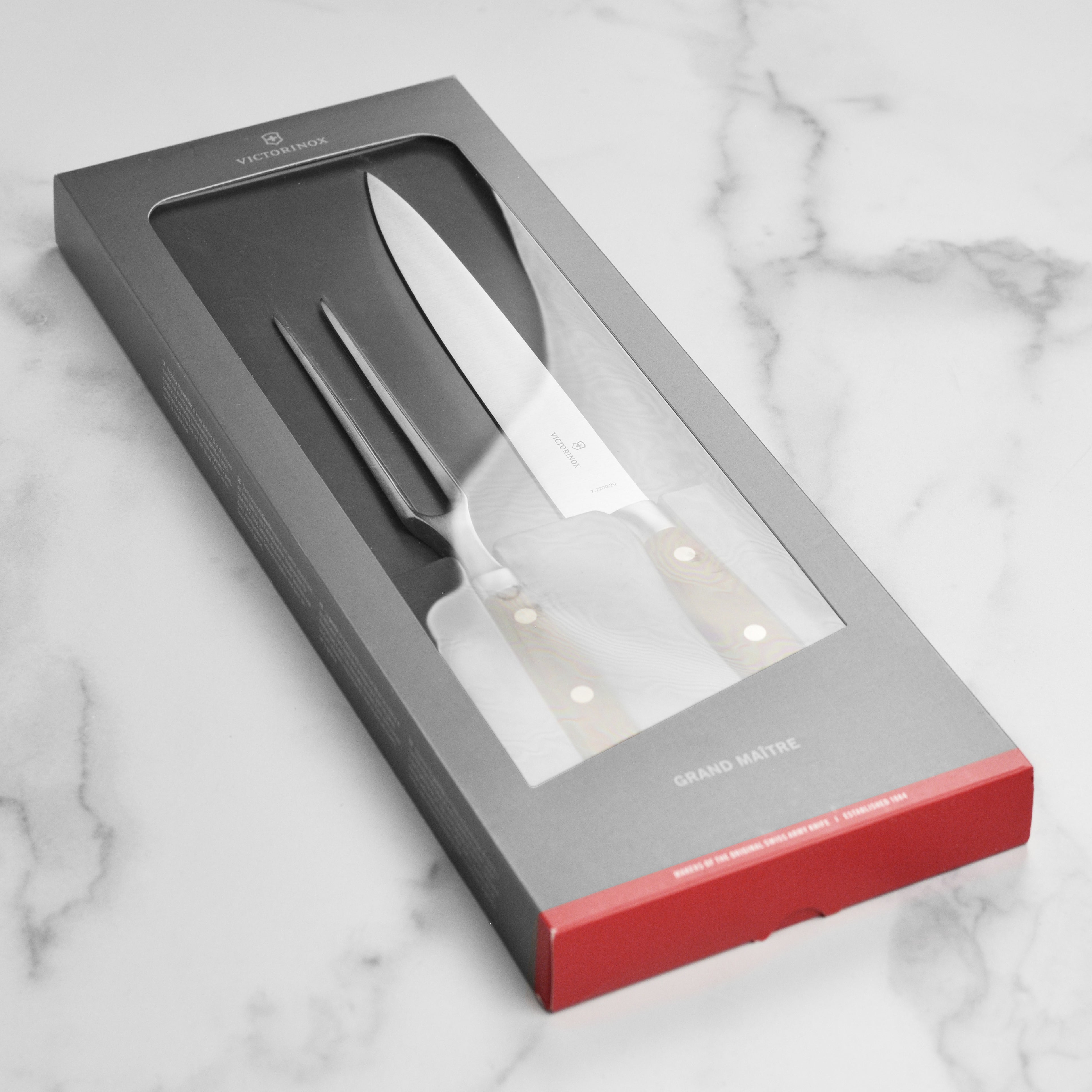 High-quality Victorinox carving knife set with ergonomic handle.
