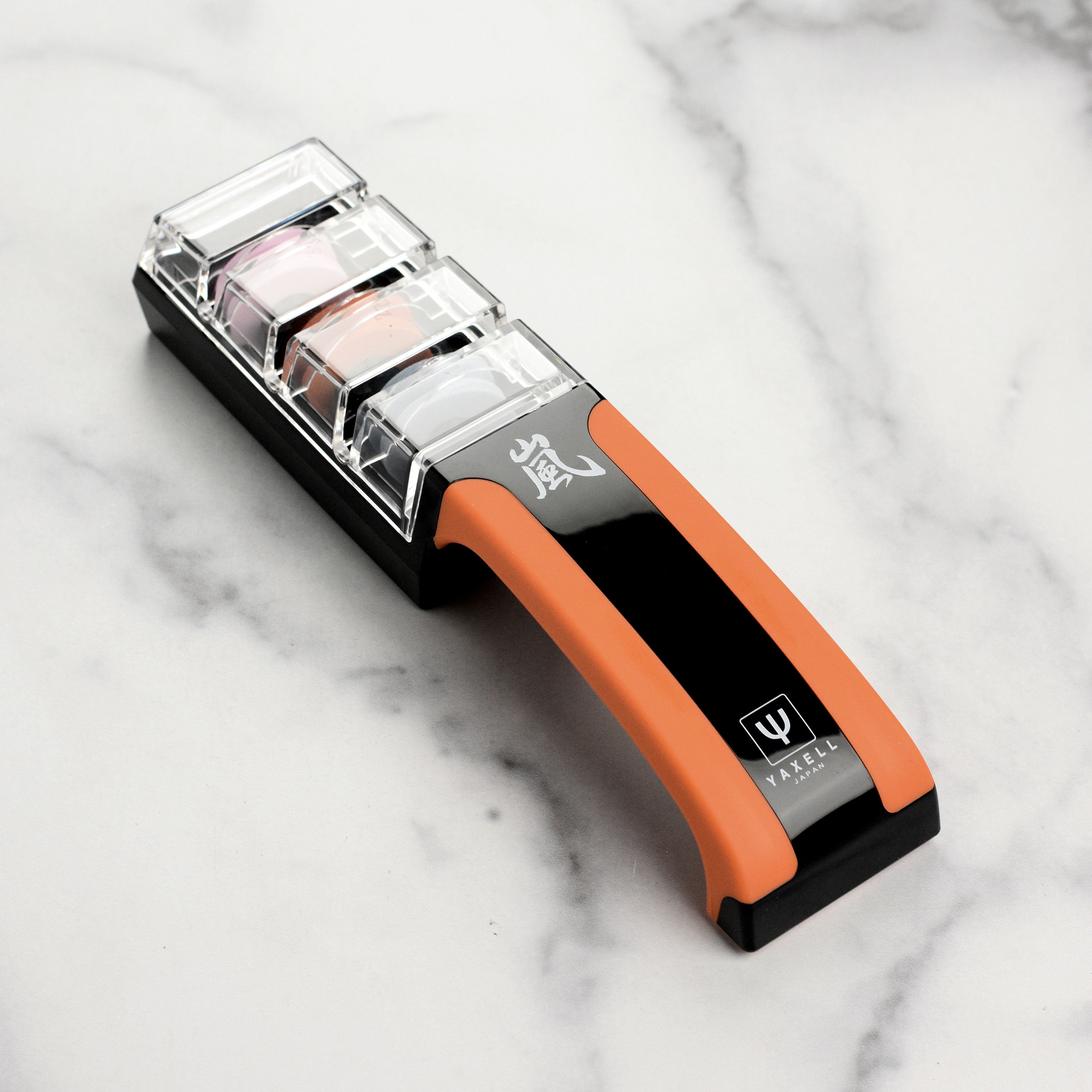 Yaxell water stone knife sharpener with grit wheels and clear lid