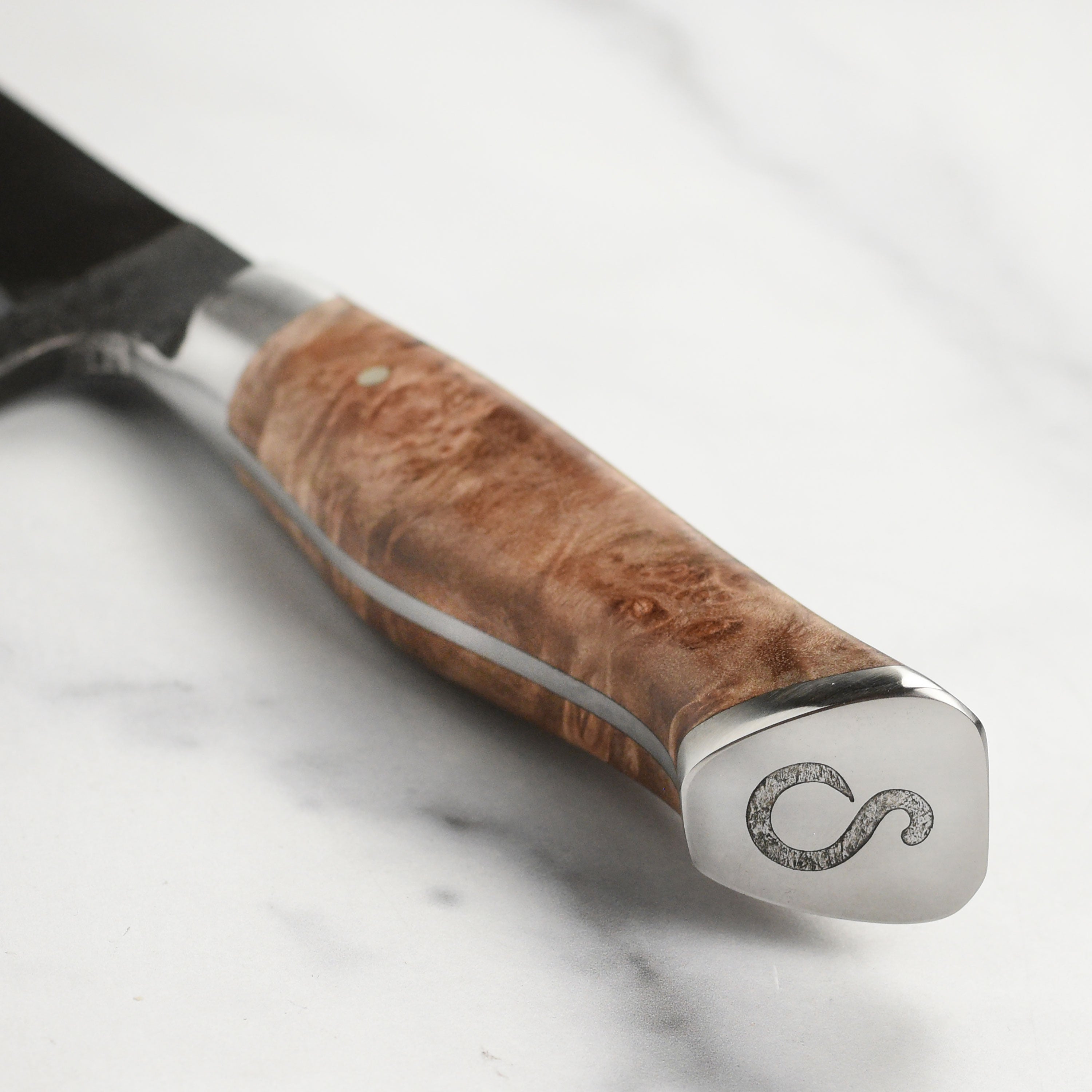 Steelport boning knife in use, demonstrating its precision in filleting fish.