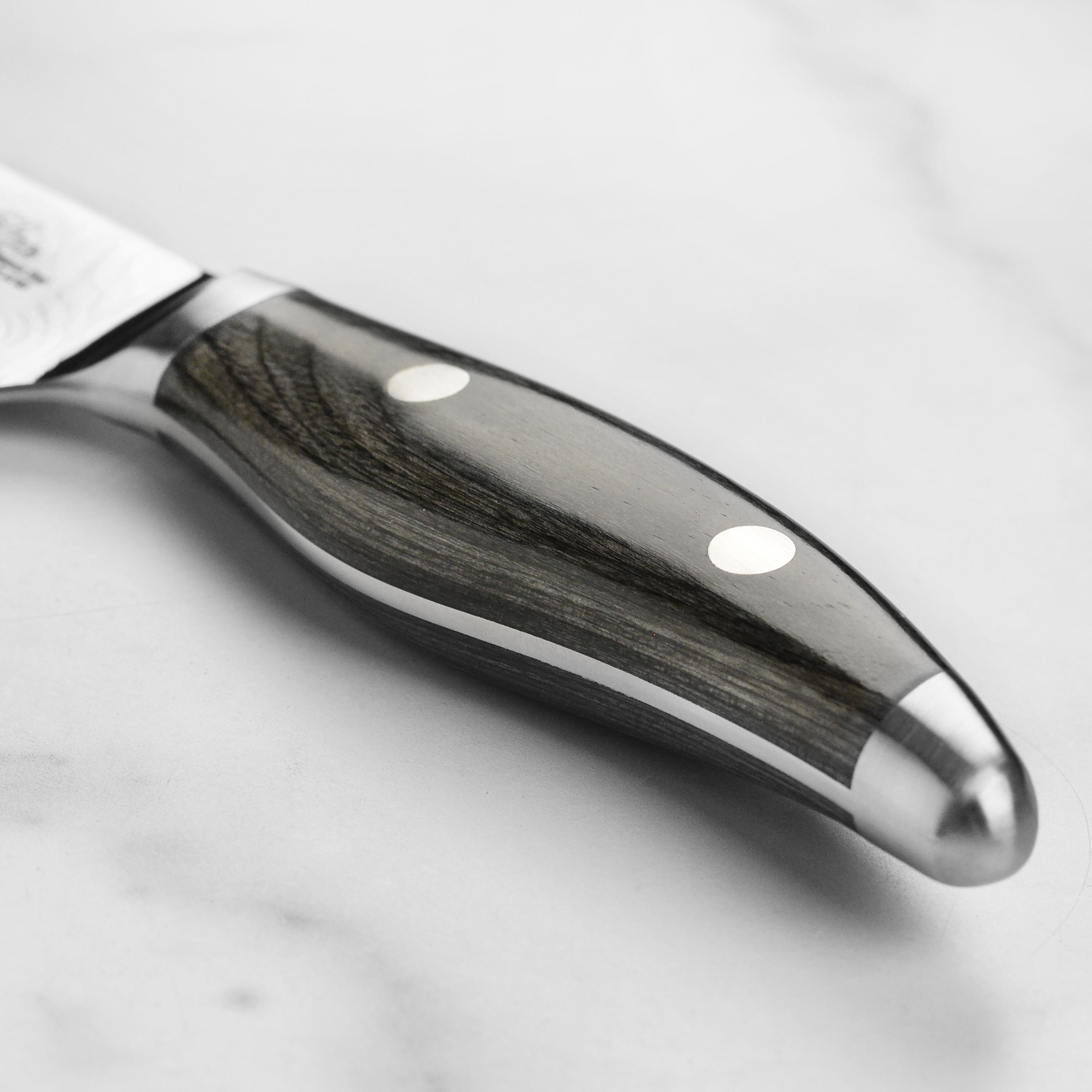 Japanese chef knife with Damascus layers, ideal for home cooks