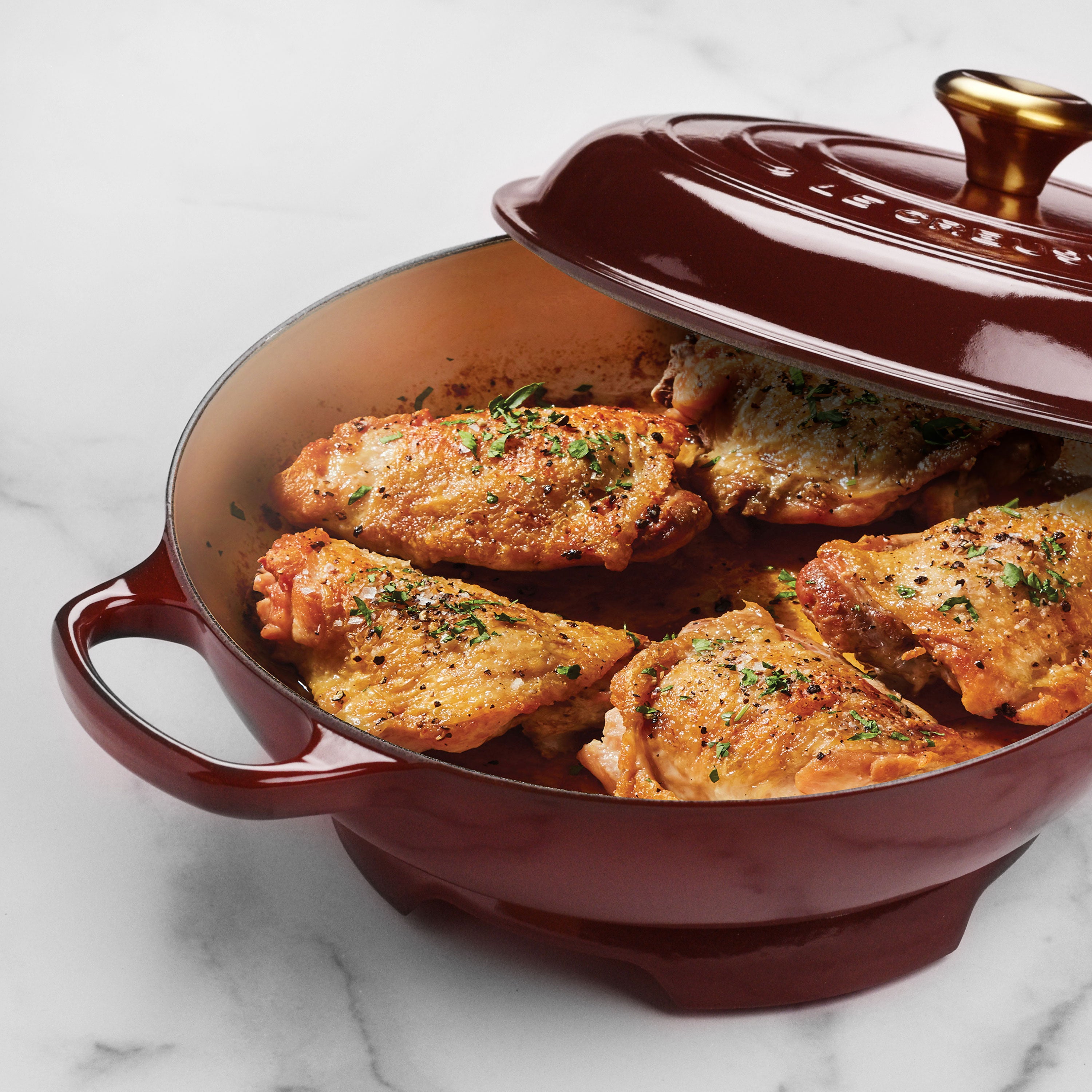 Using the Le Creuset cast iron trivet to hold a hot pot during meal prep