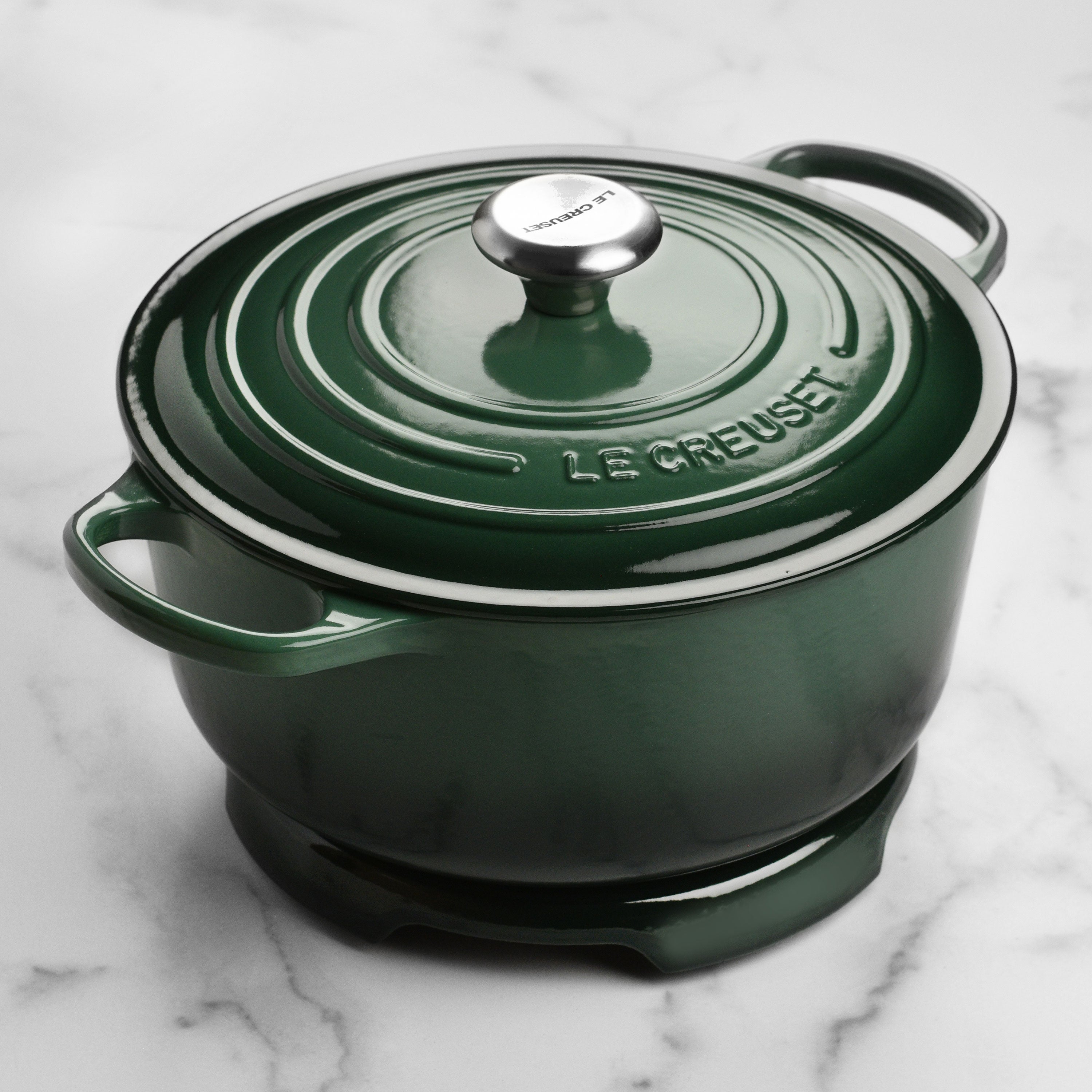 Hot cookware resting on the durable cast iron trivet in a modern kitchen