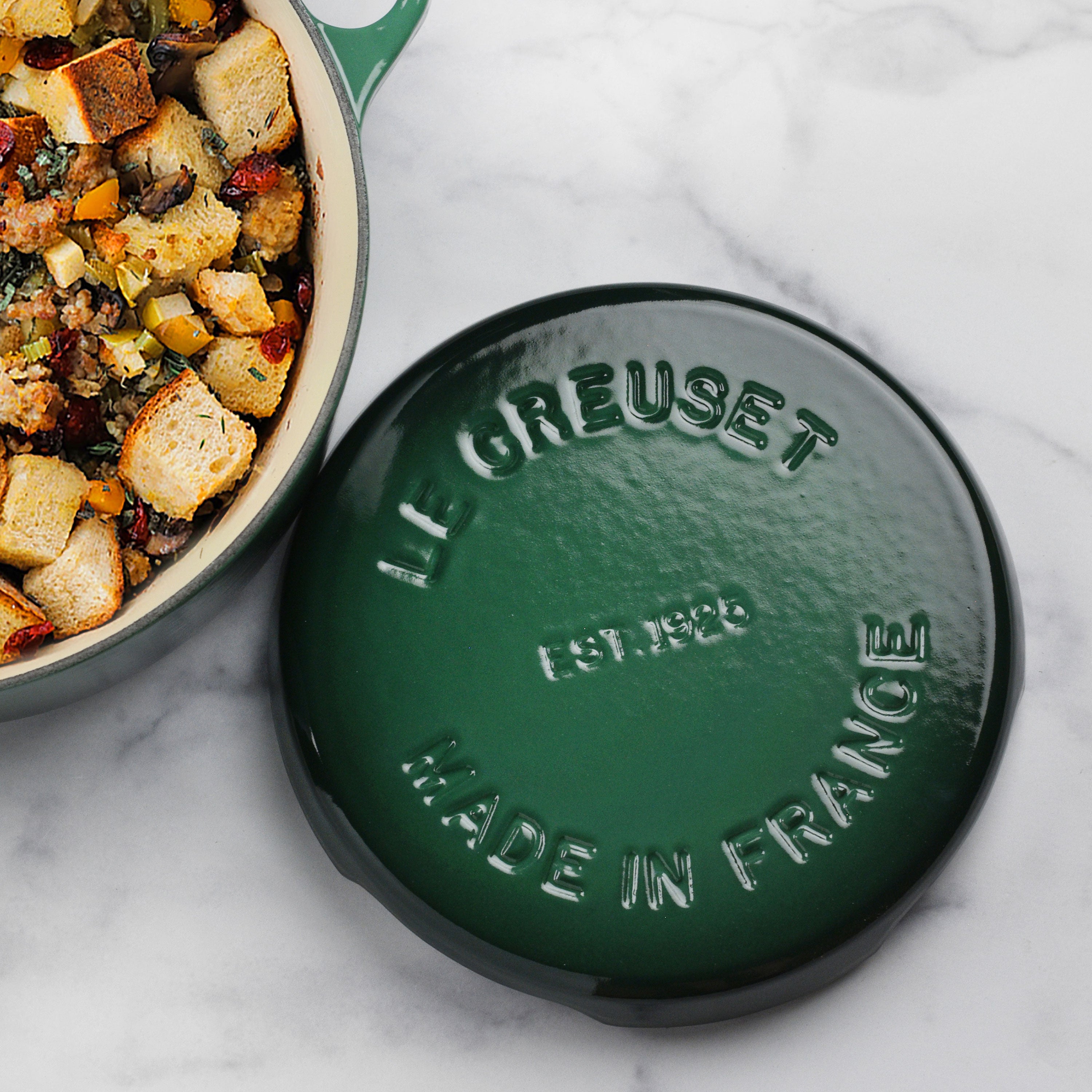 Hot cookware resting on the durable cast iron trivet in a modern kitchen