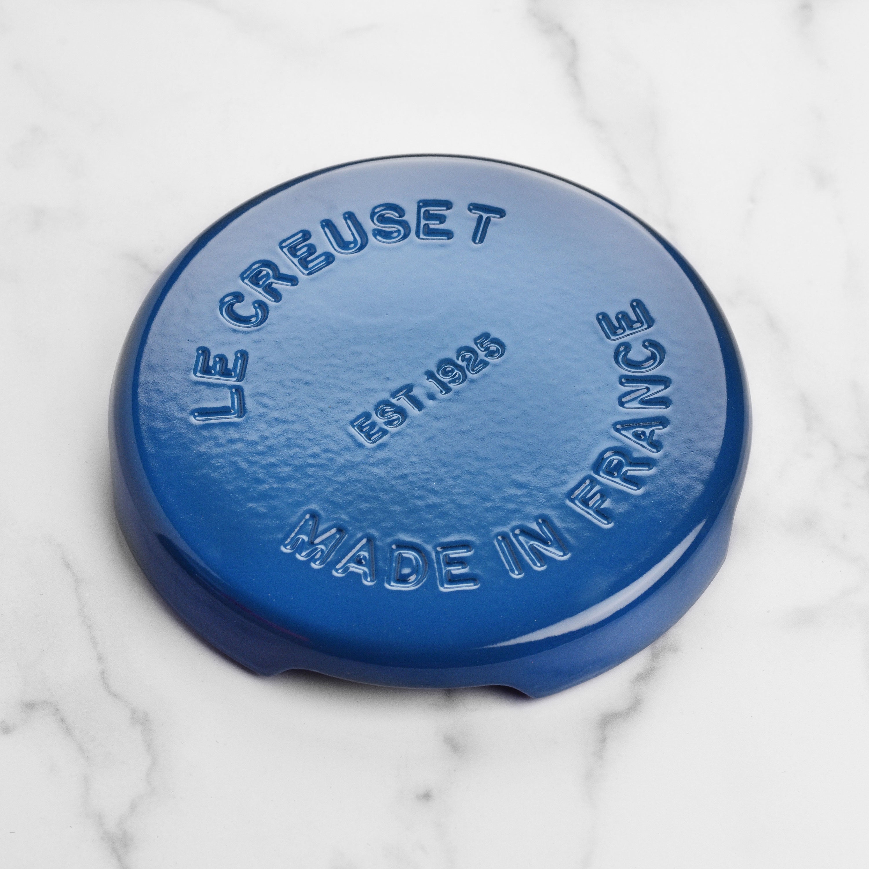 Close-up of Le Creuset Marseille Round Heat Resistant Trivet showcasing its enameled finish.