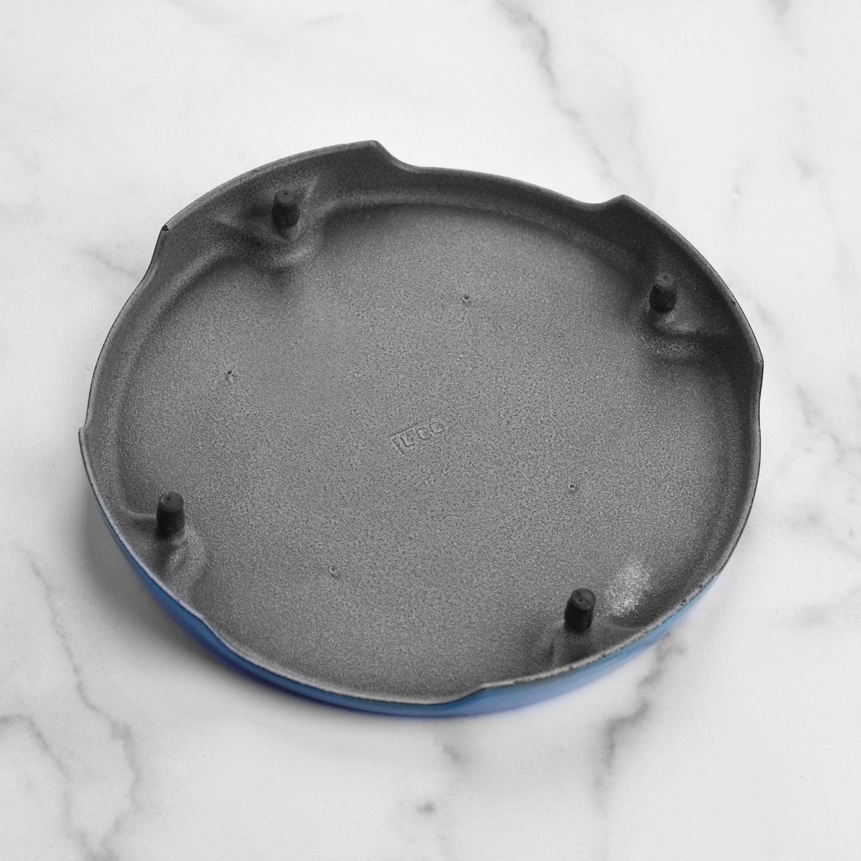 Close-up of Le Creuset Marseille Round Heat Resistant Trivet showcasing its enameled finish.