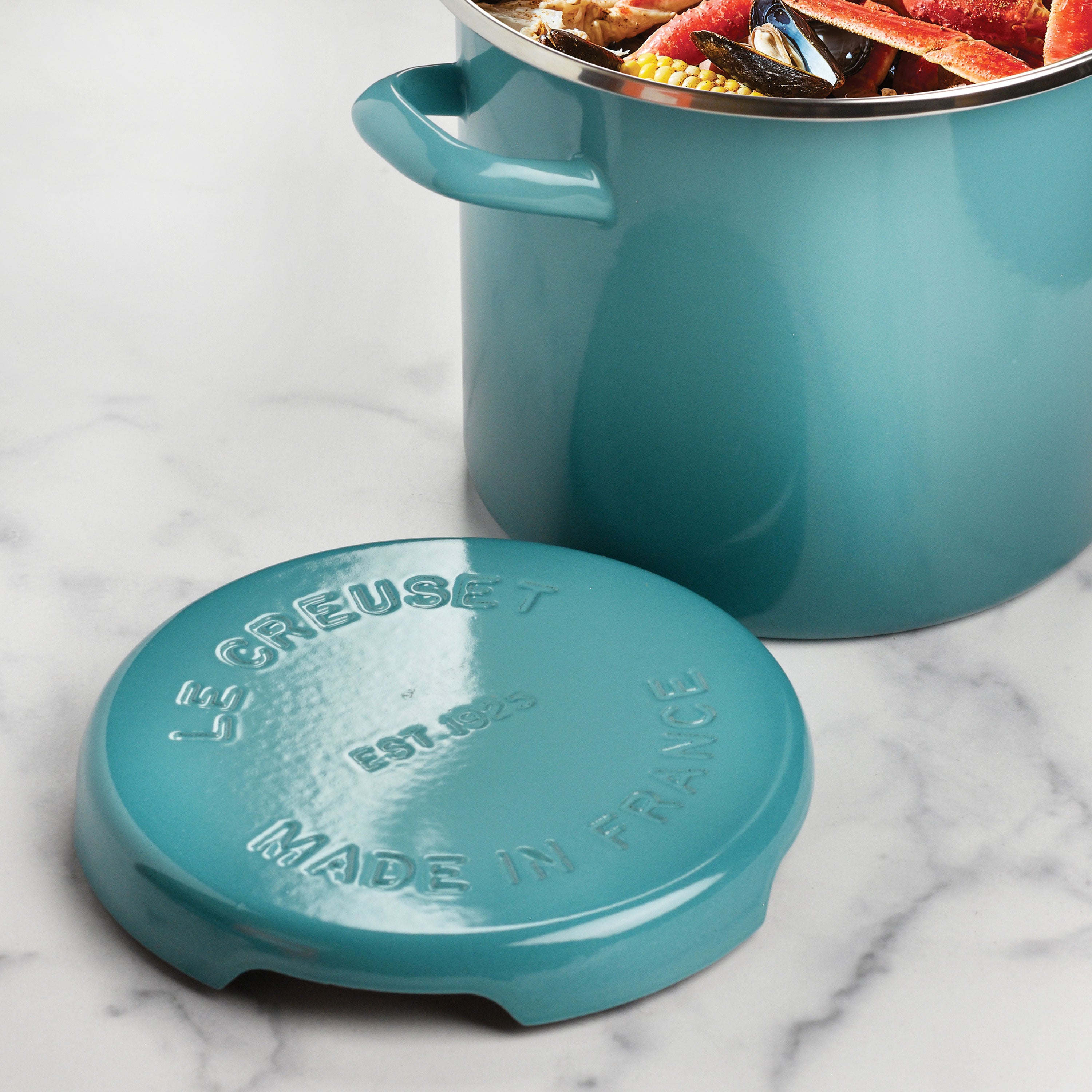 Heat-resistant trivet on a dining table, protecting the surface from a hot dish.