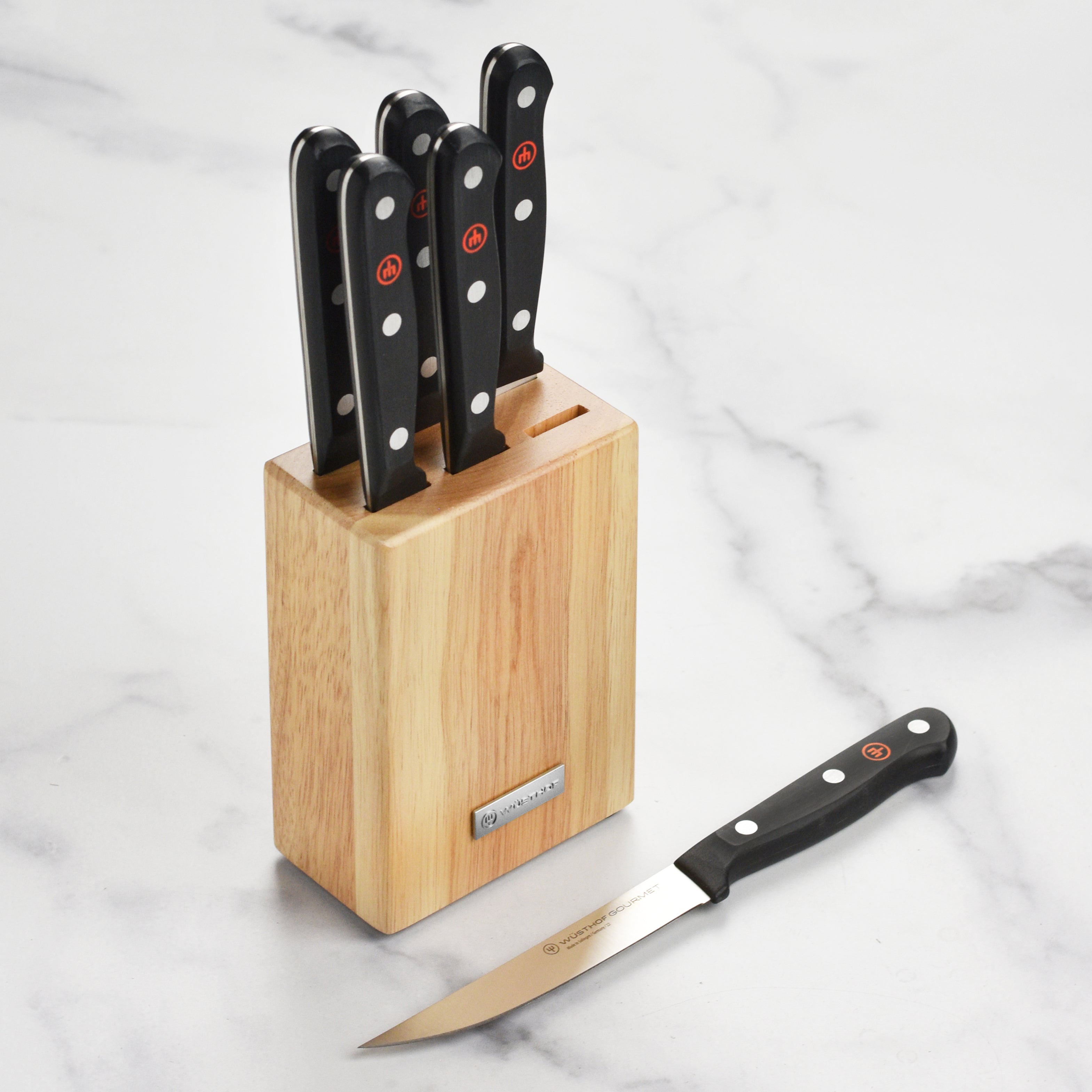 Close-up of the Wusthof gourmet steak knives highlighting the sharp blade and ergonomic handle.