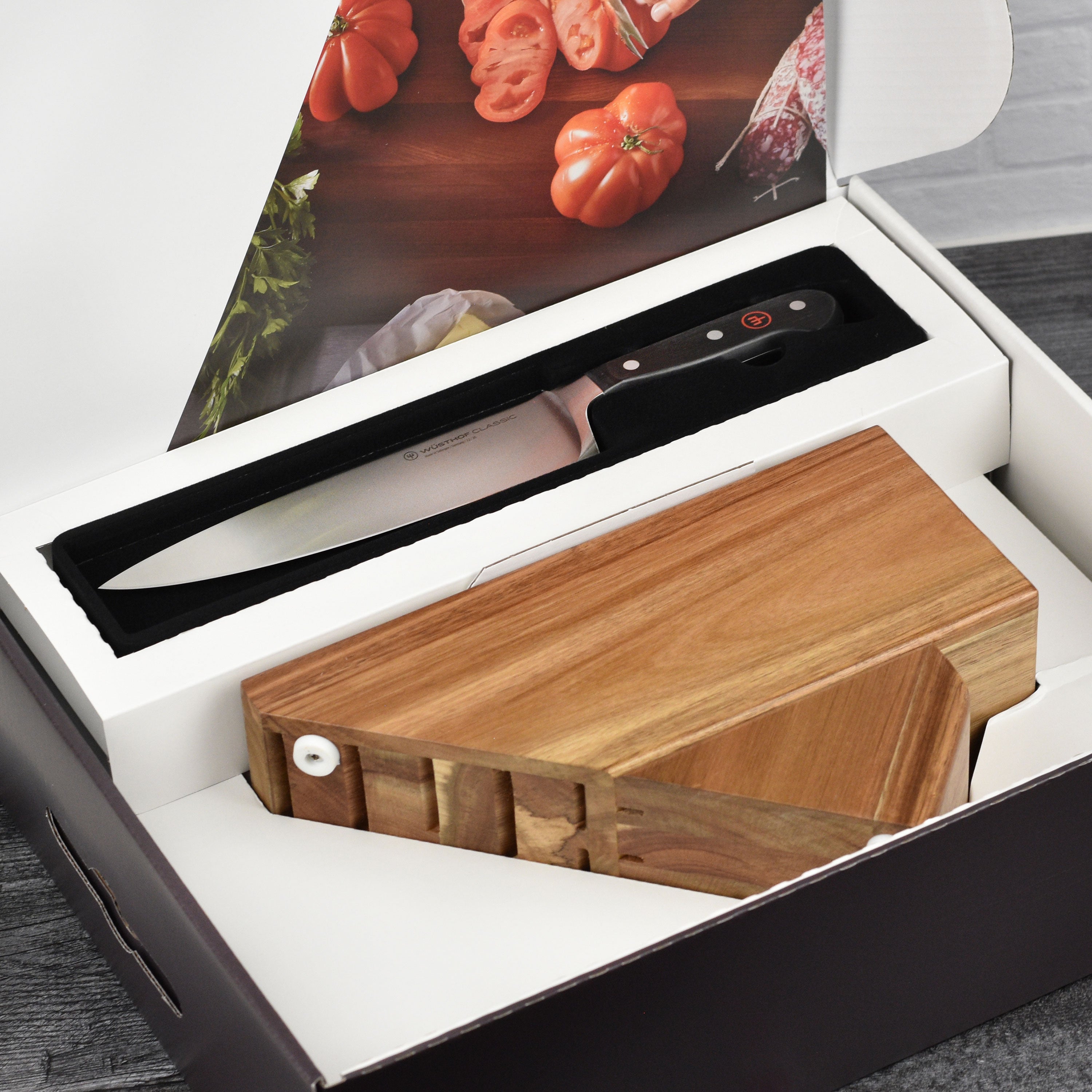 Detailed view of the handle and blade of a Wusthof kitchen knife for professional chefs