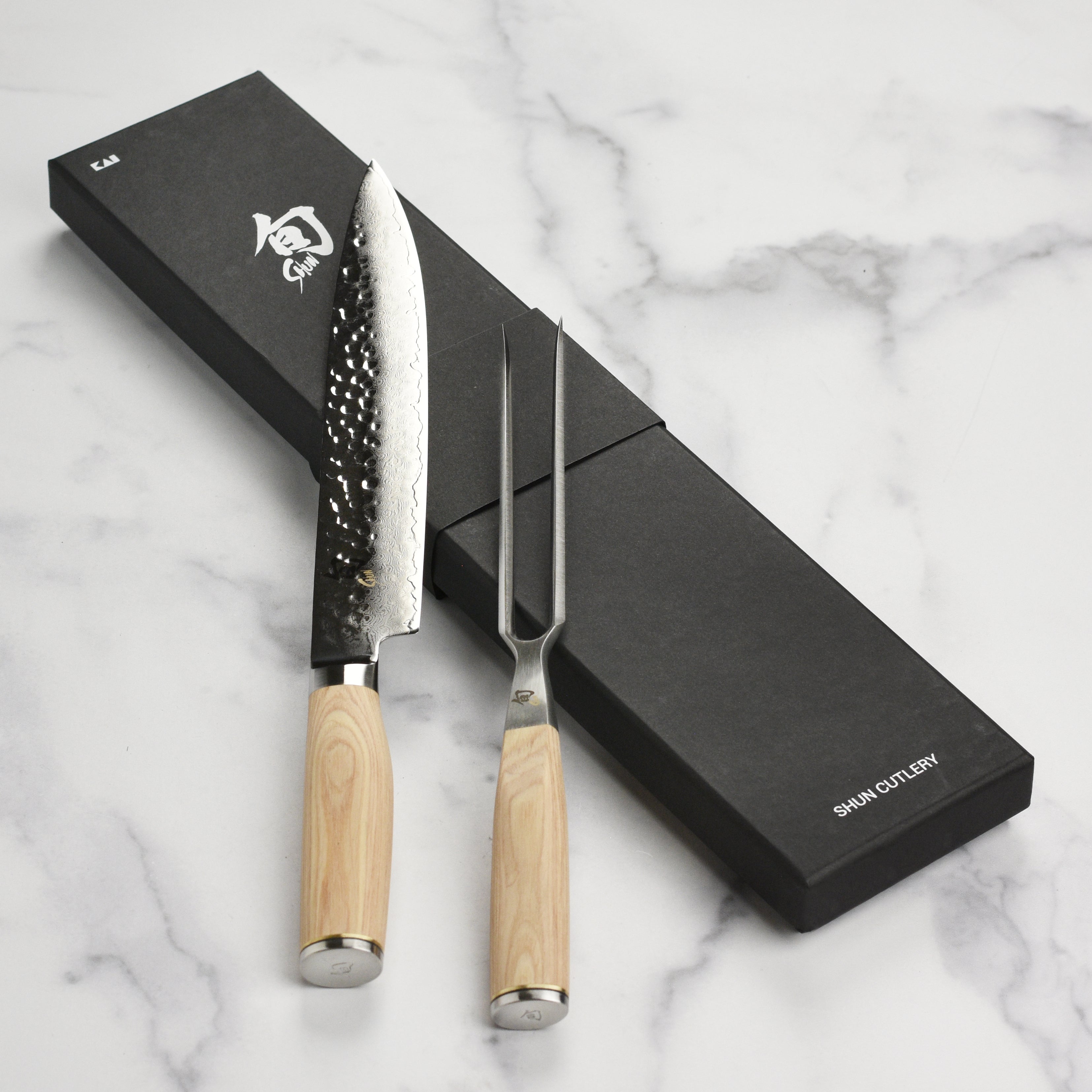 Close-up of the Shun Premier Blonde knife handle, emphasizing the ergonomic design for comfortable use.
