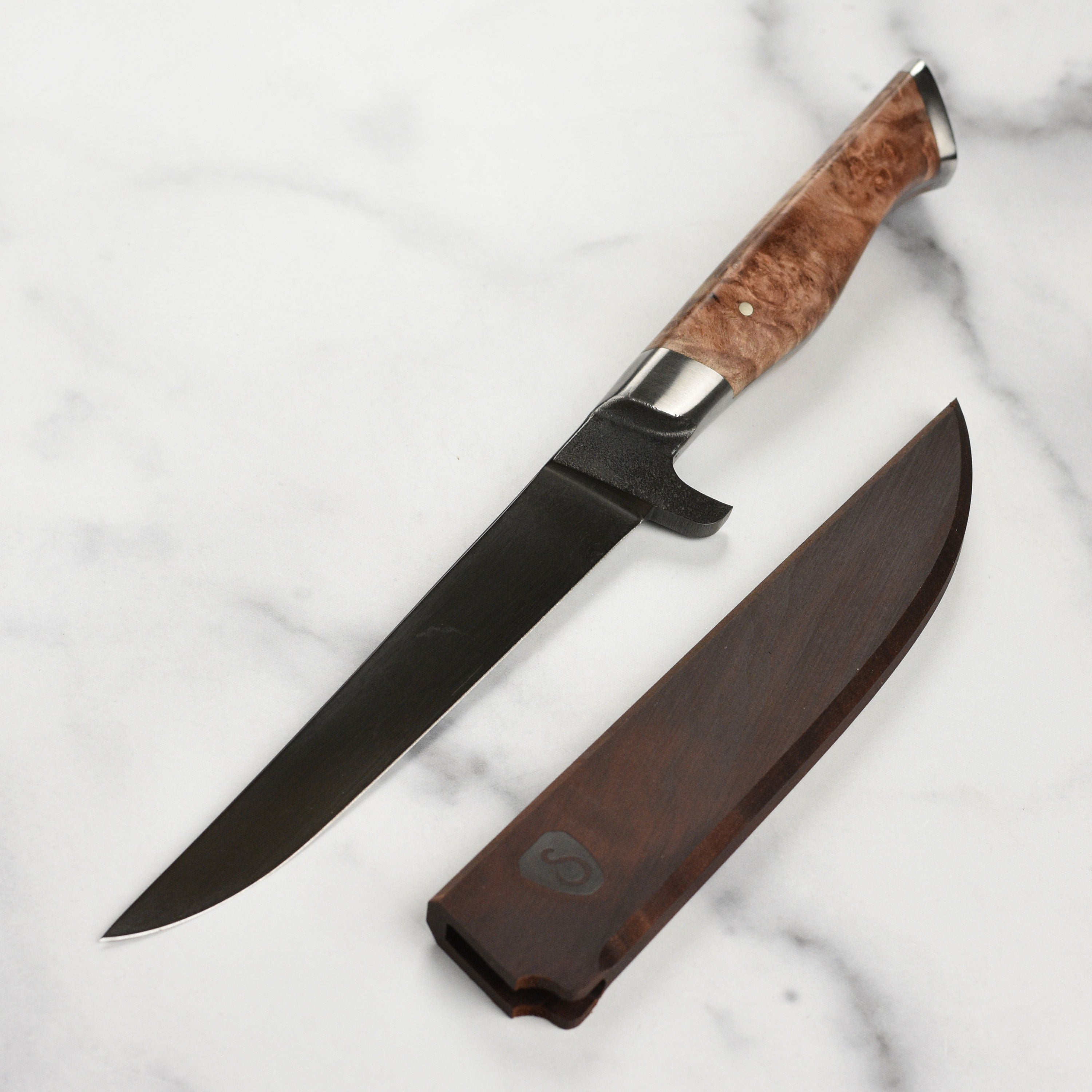 Oregon maple magnetic knife sheath showcasing a 6 inch boning knife securely held in place.
