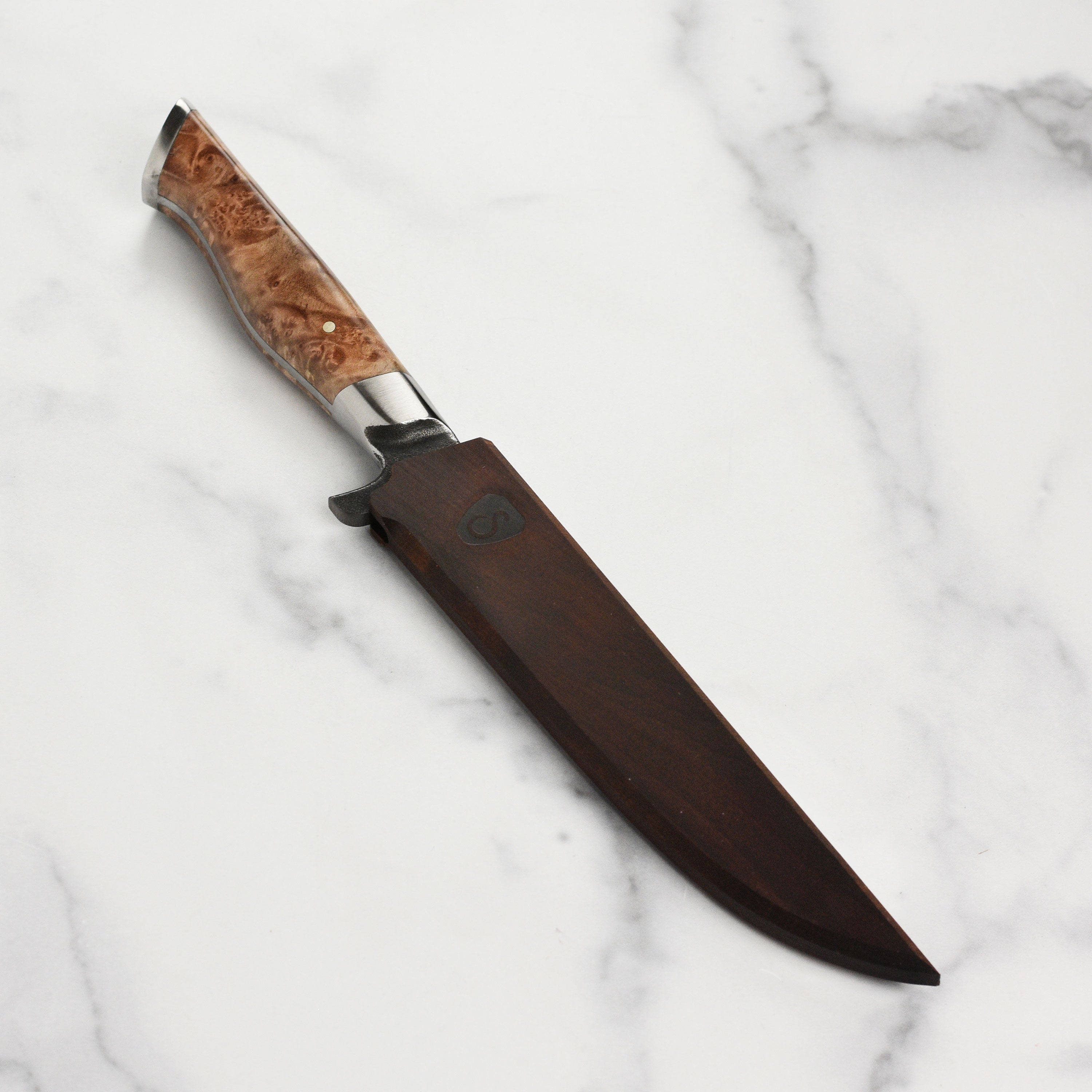 Oregon maple magnetic knife sheath showcasing a 6 inch boning knife securely held in place.