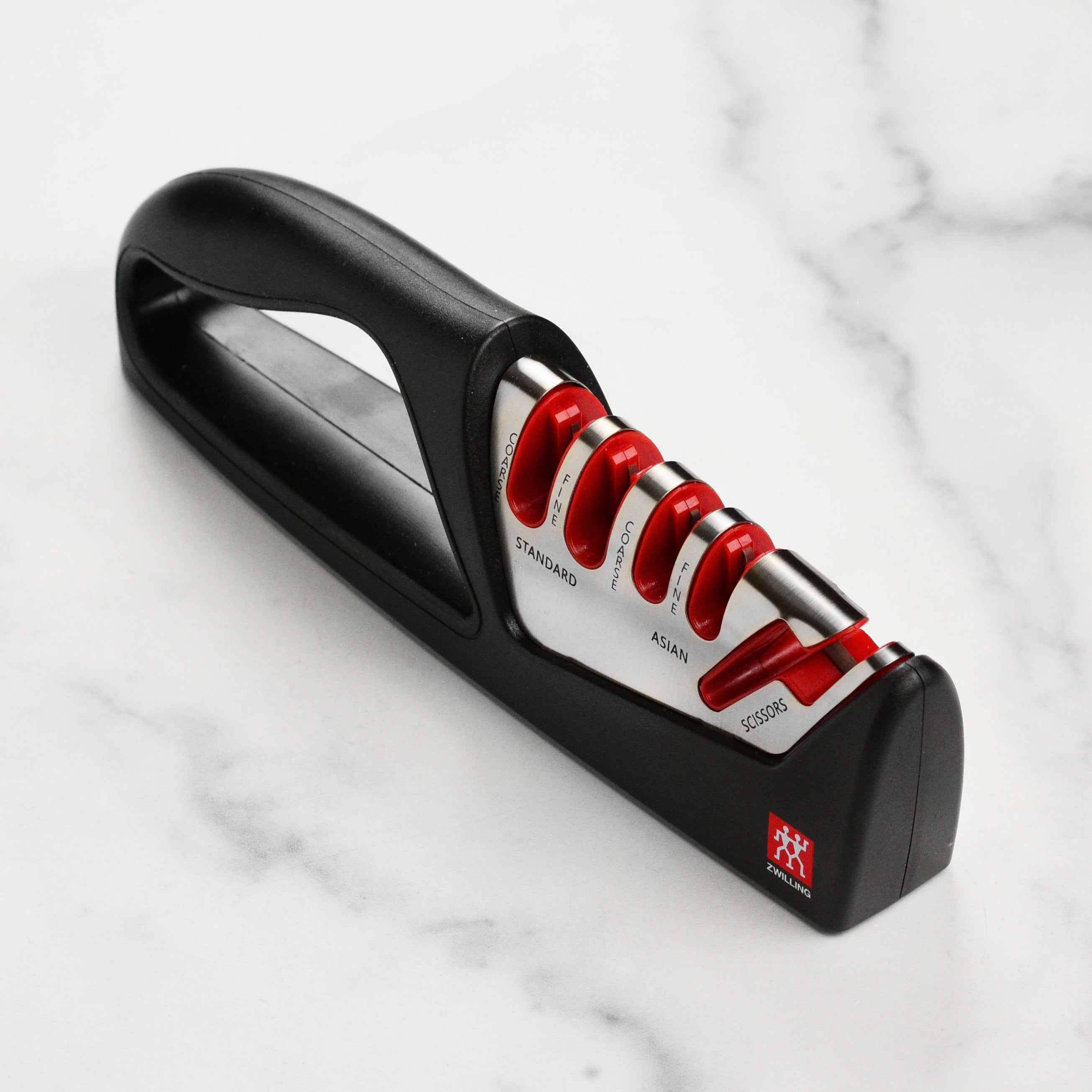 Close-up of the Zwilling 4-stage knife and scissors sharpener with safety grip