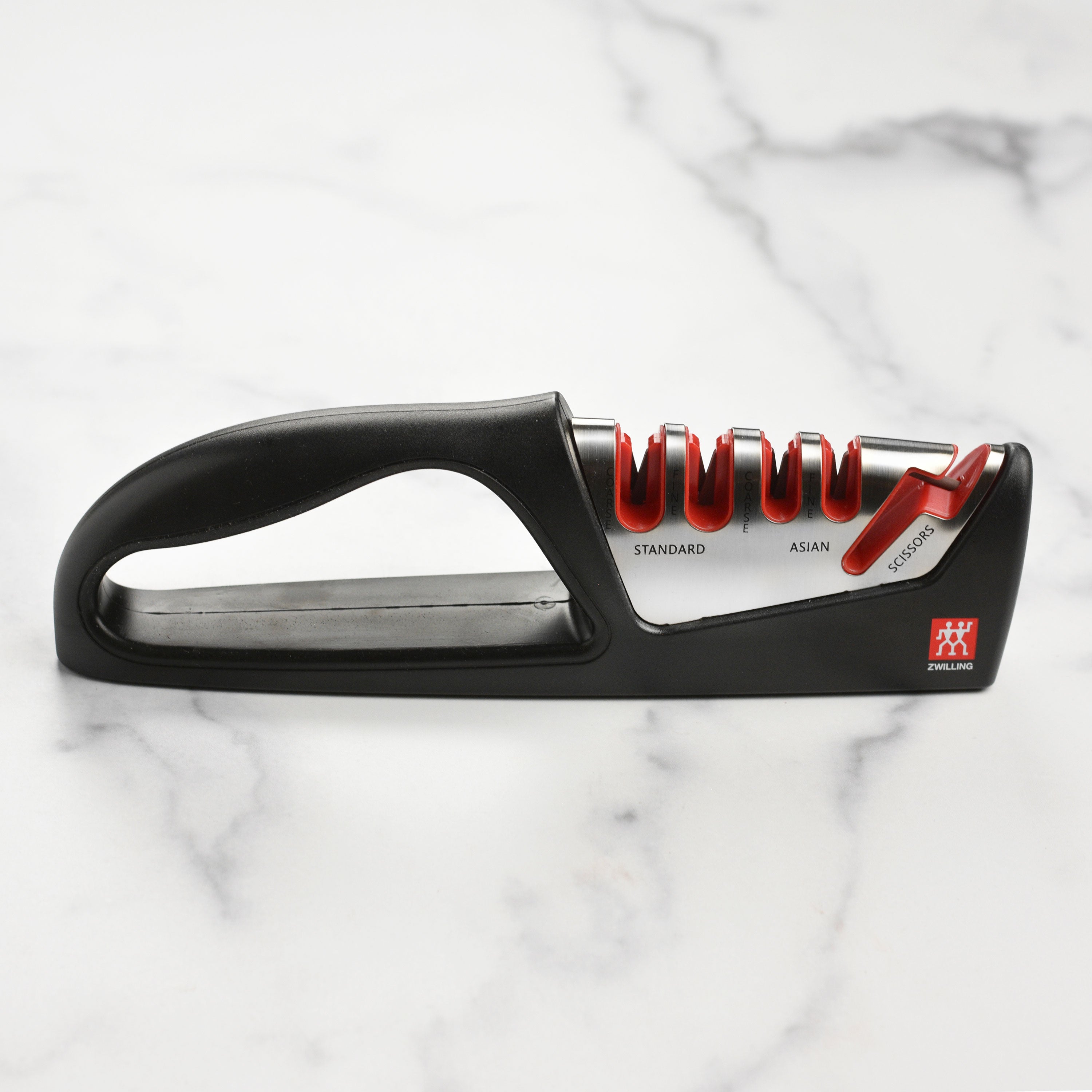Close-up of the Zwilling 4-stage knife and scissors sharpener with safety grip