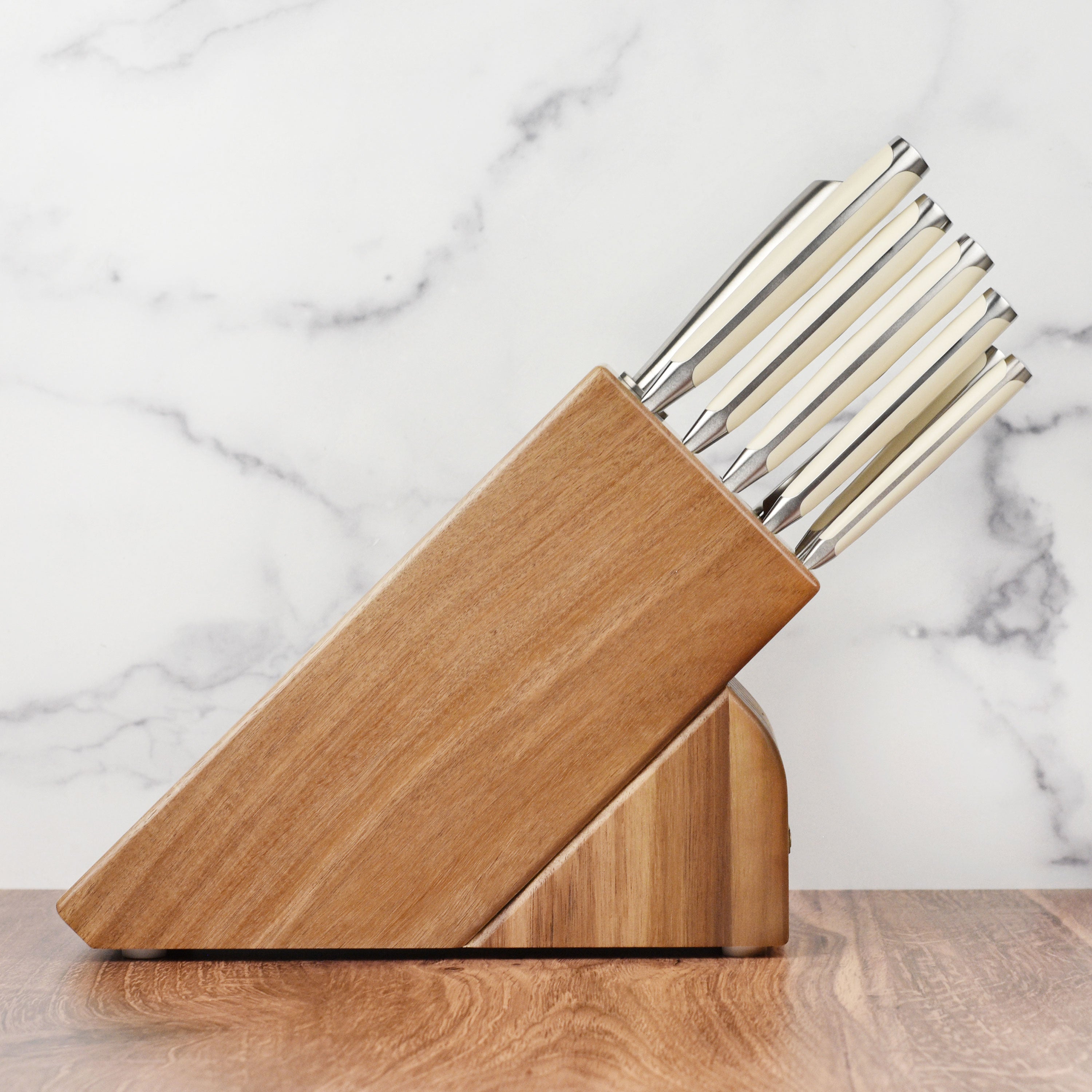 Set of premium stainless steel professional knives in an acacia wood block for home cooks