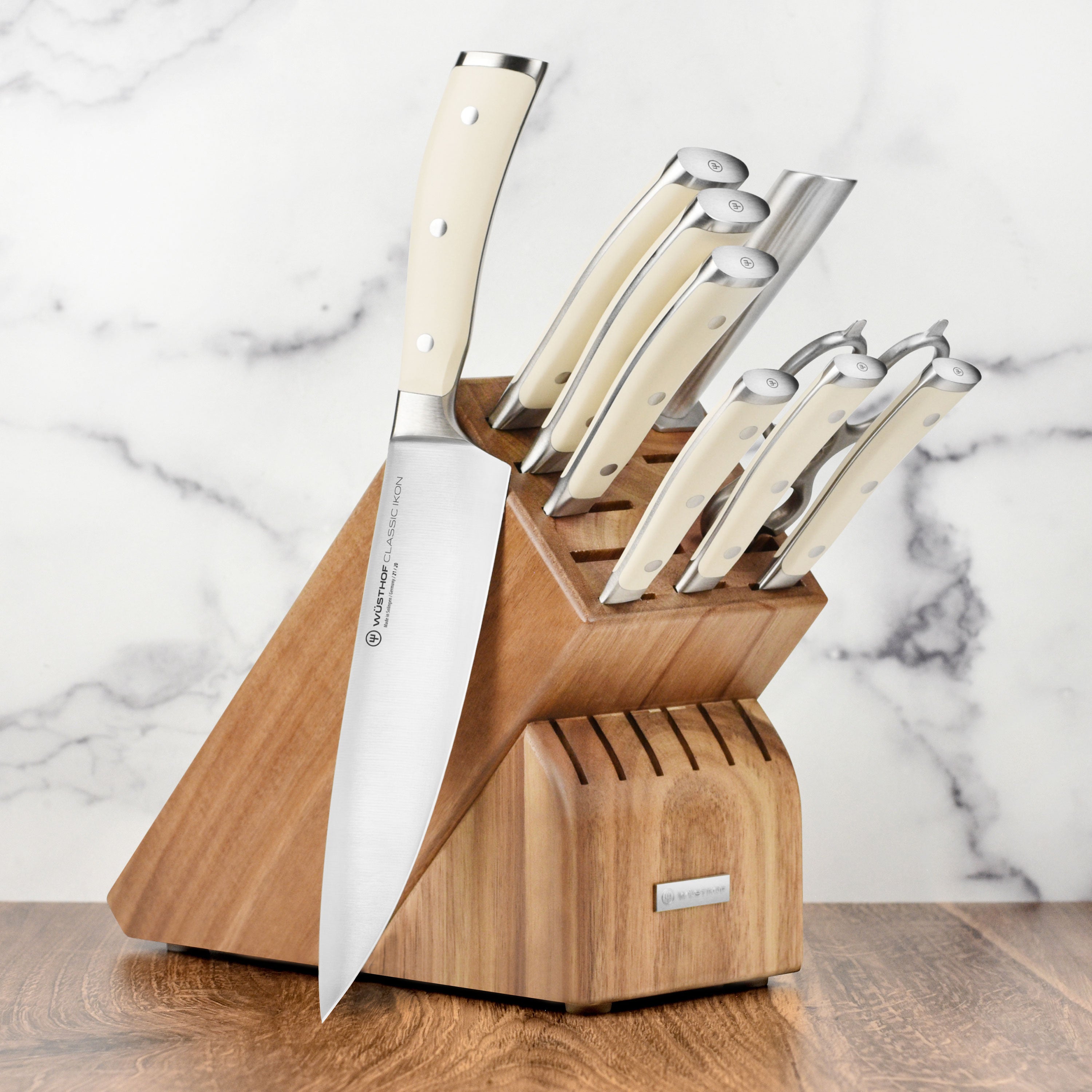 Set of premium stainless steel professional knives in an acacia wood block for home cooks