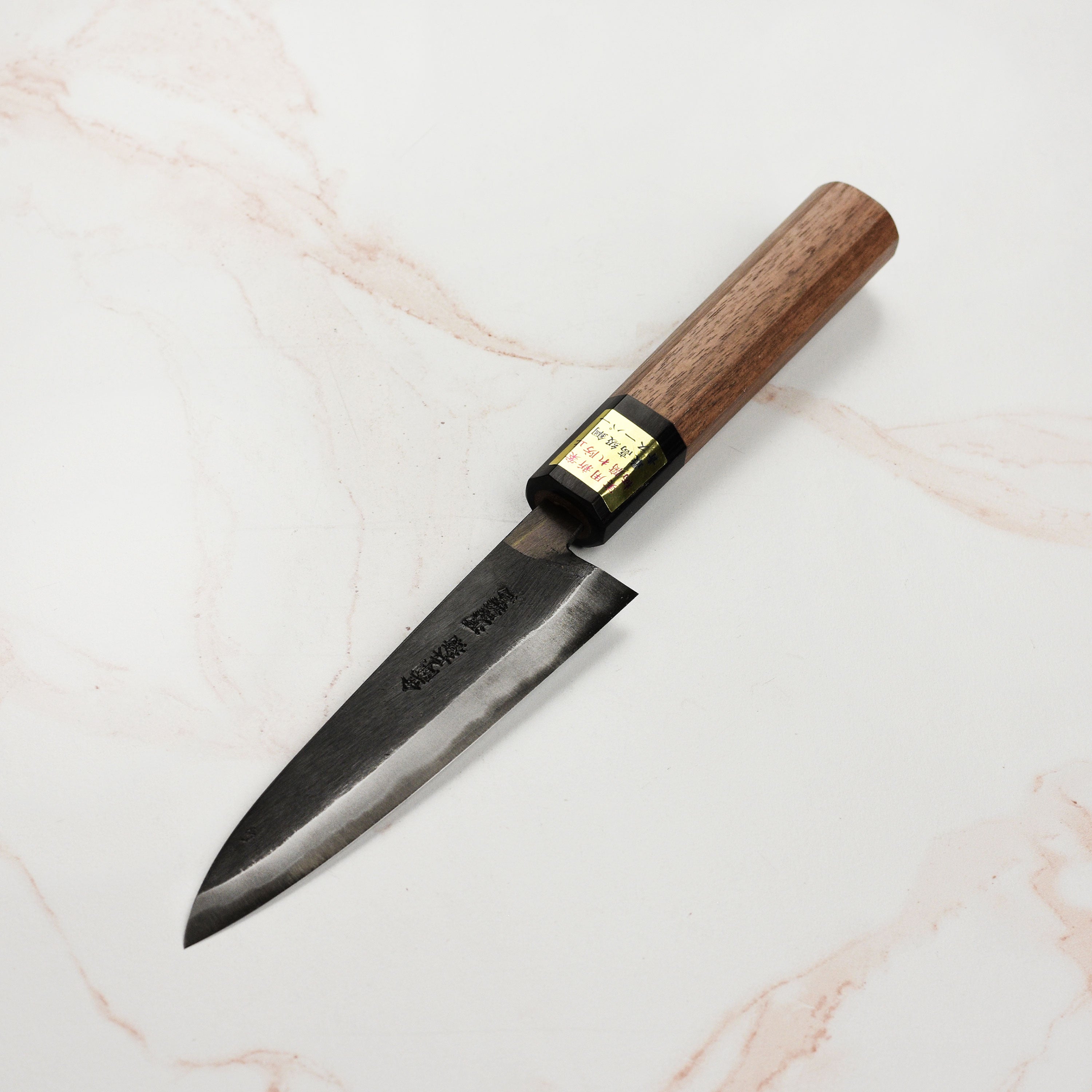Front view of Moritaka Aogami Super petty knife showing sharp blade and handle