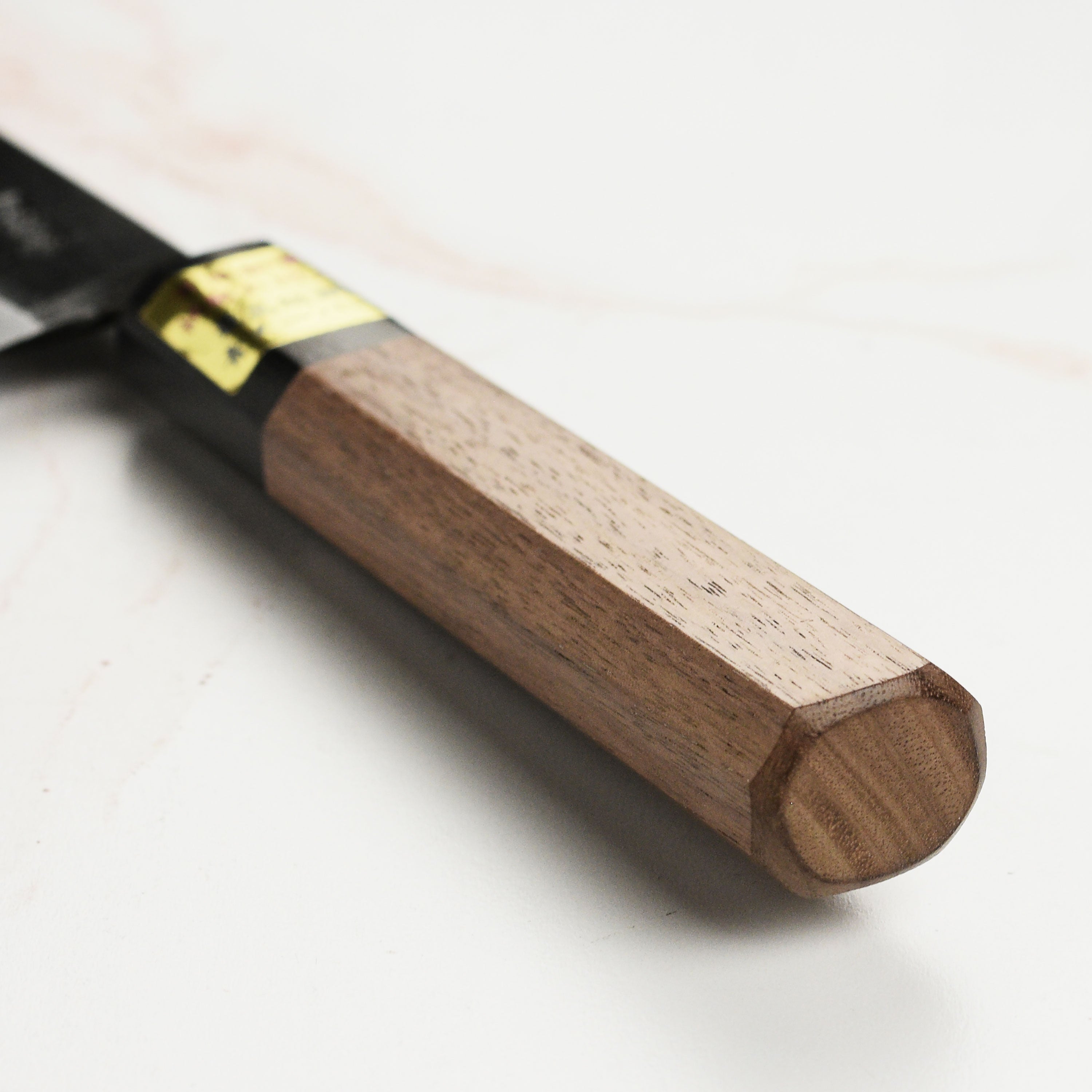 Chef slicing vegetables with the Moritaka Japanese petty knife