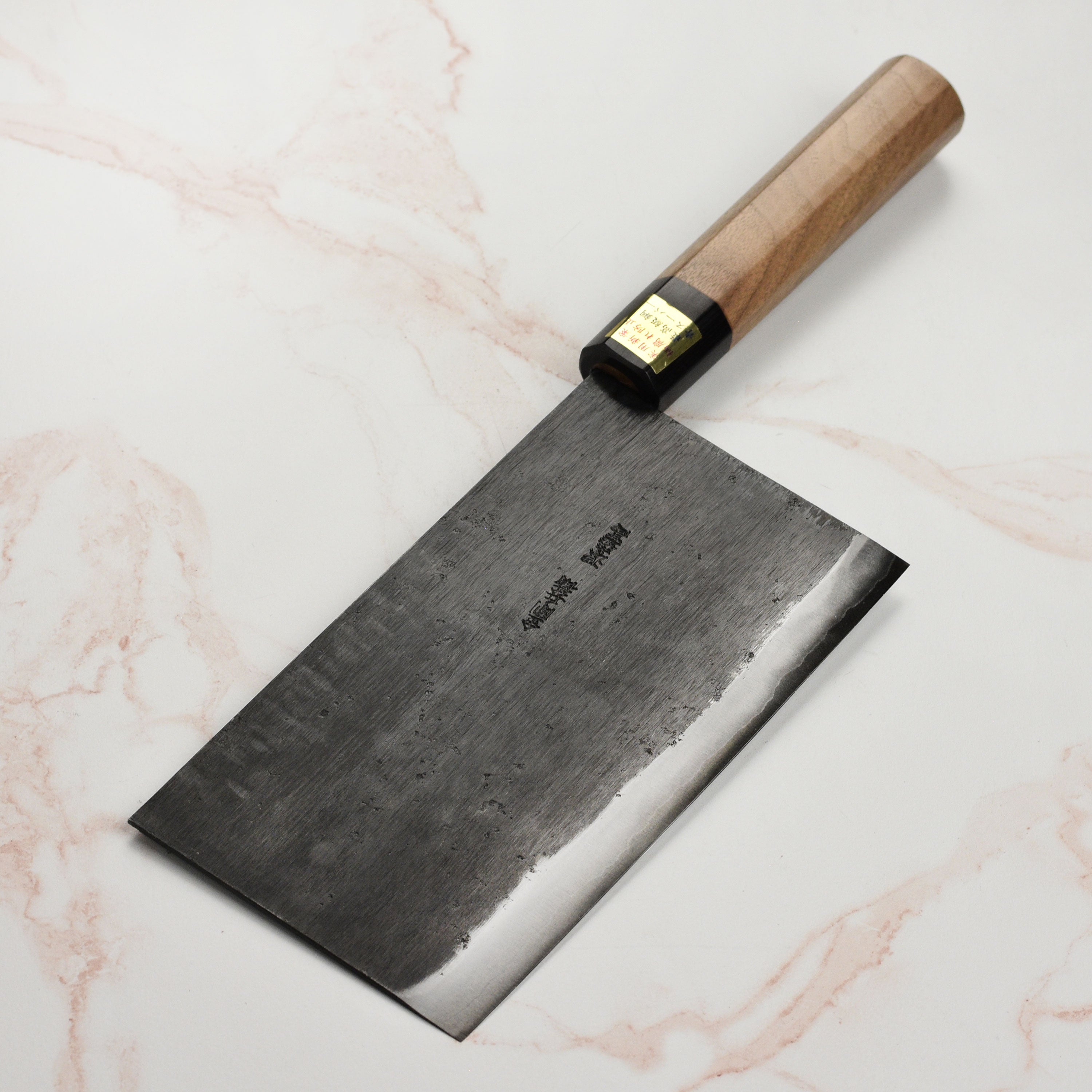 Close-up of Moritaka 7.5-inch Aogami Super carbon steel chef's knife blade highlighting sharp edge