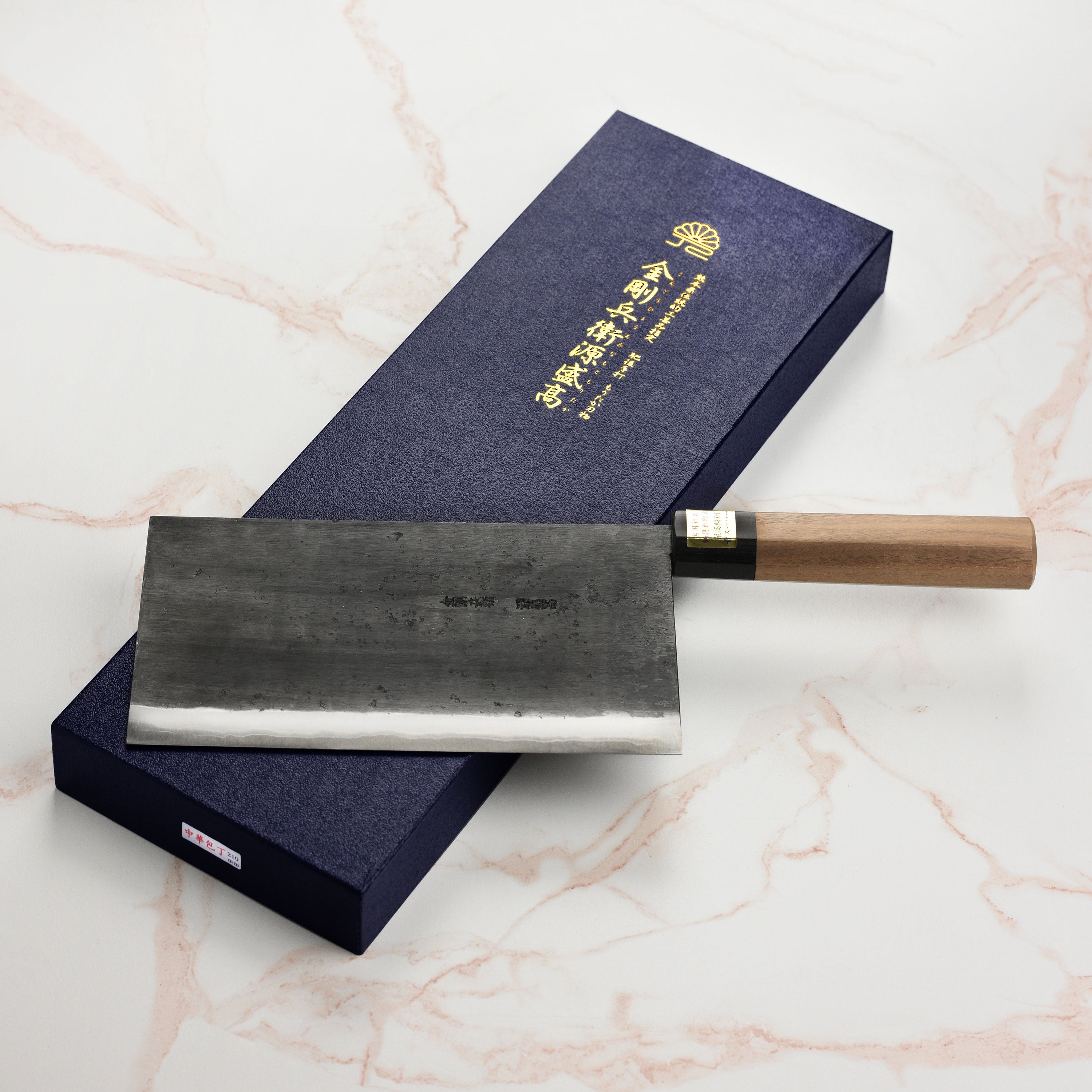 Moritaka chefs knife displayed on a wooden cutting board, highlighting its craftsmanship and design.