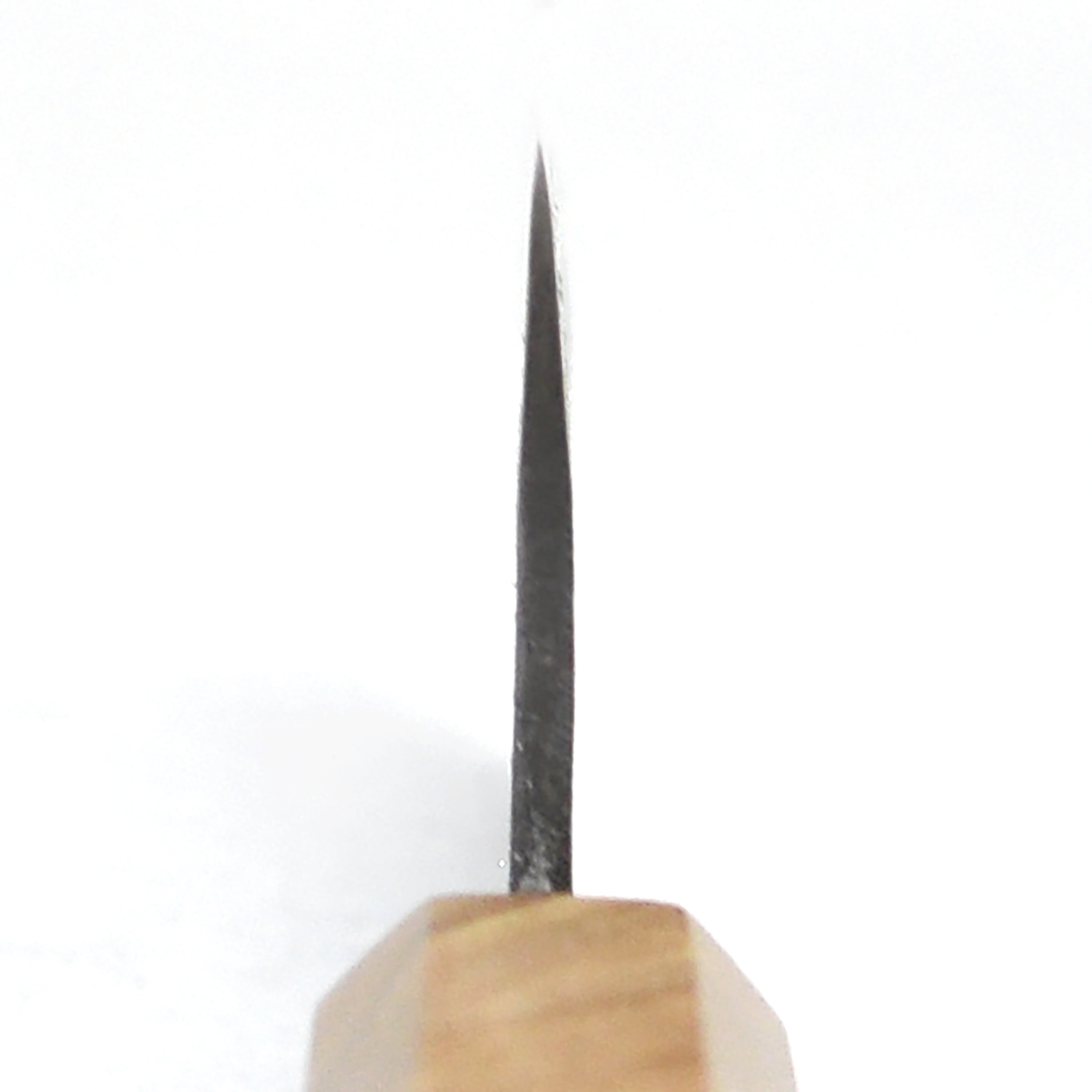 Close-up of Kurouchi finish and sharp edge on the 6.5-inch Santoku knife