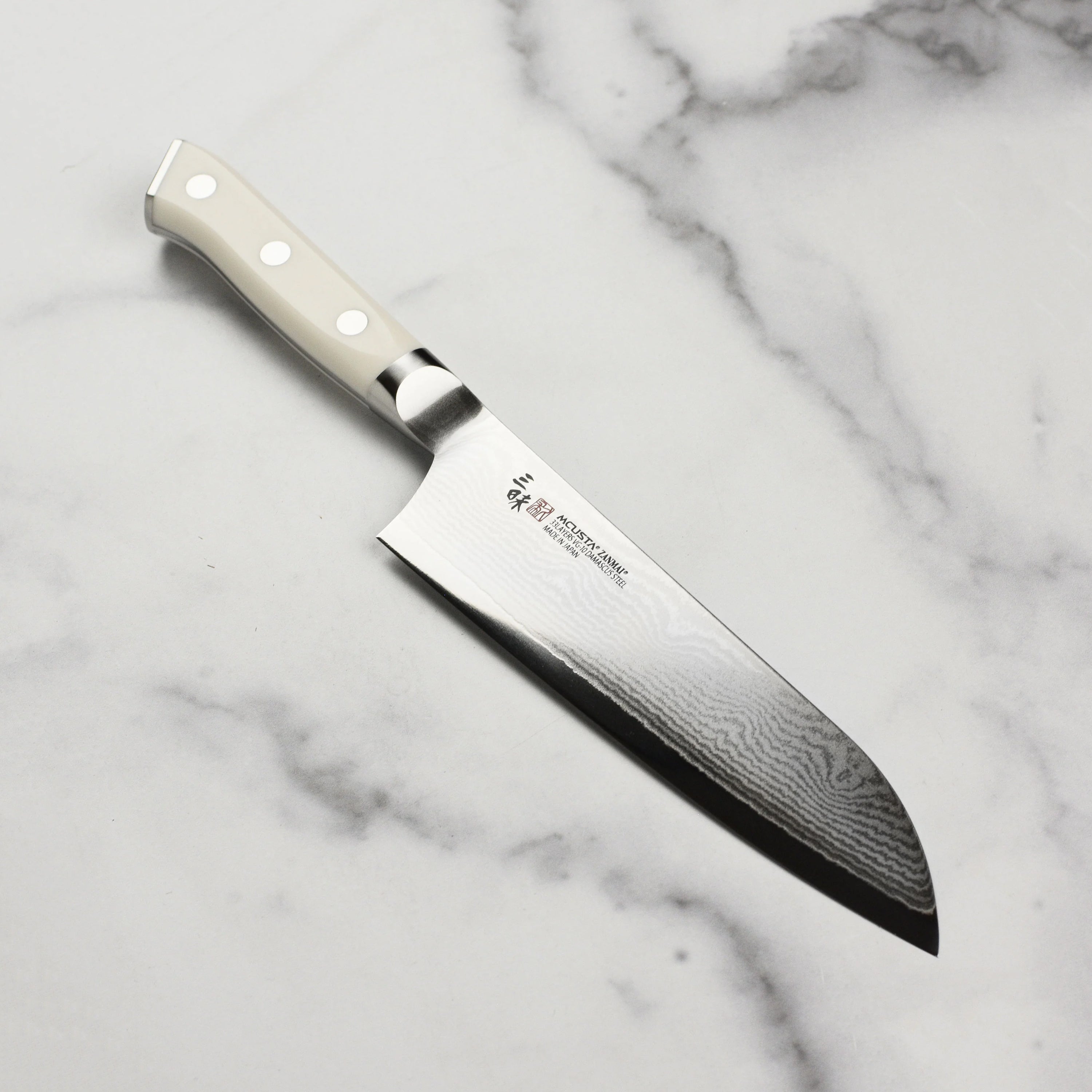 Zanmai Classic 7-Inch Santoku Knife featuring a Damascus stainless steel blade