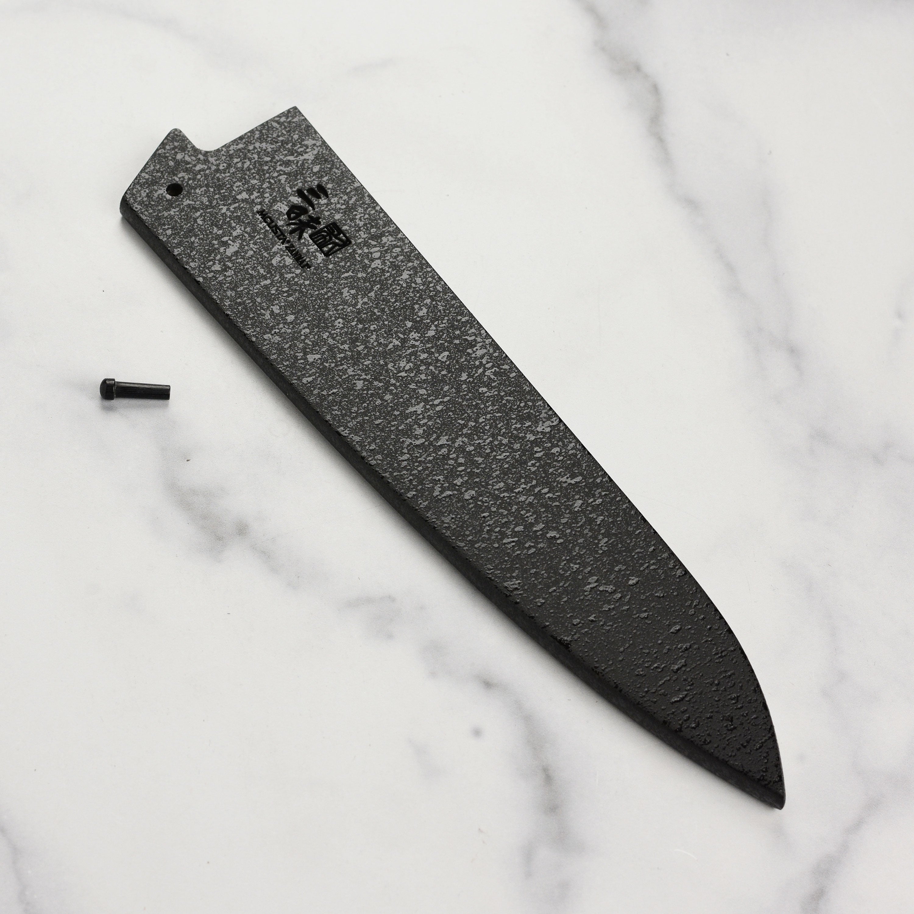 Close-up of the black lacquer knife saya for 8.25