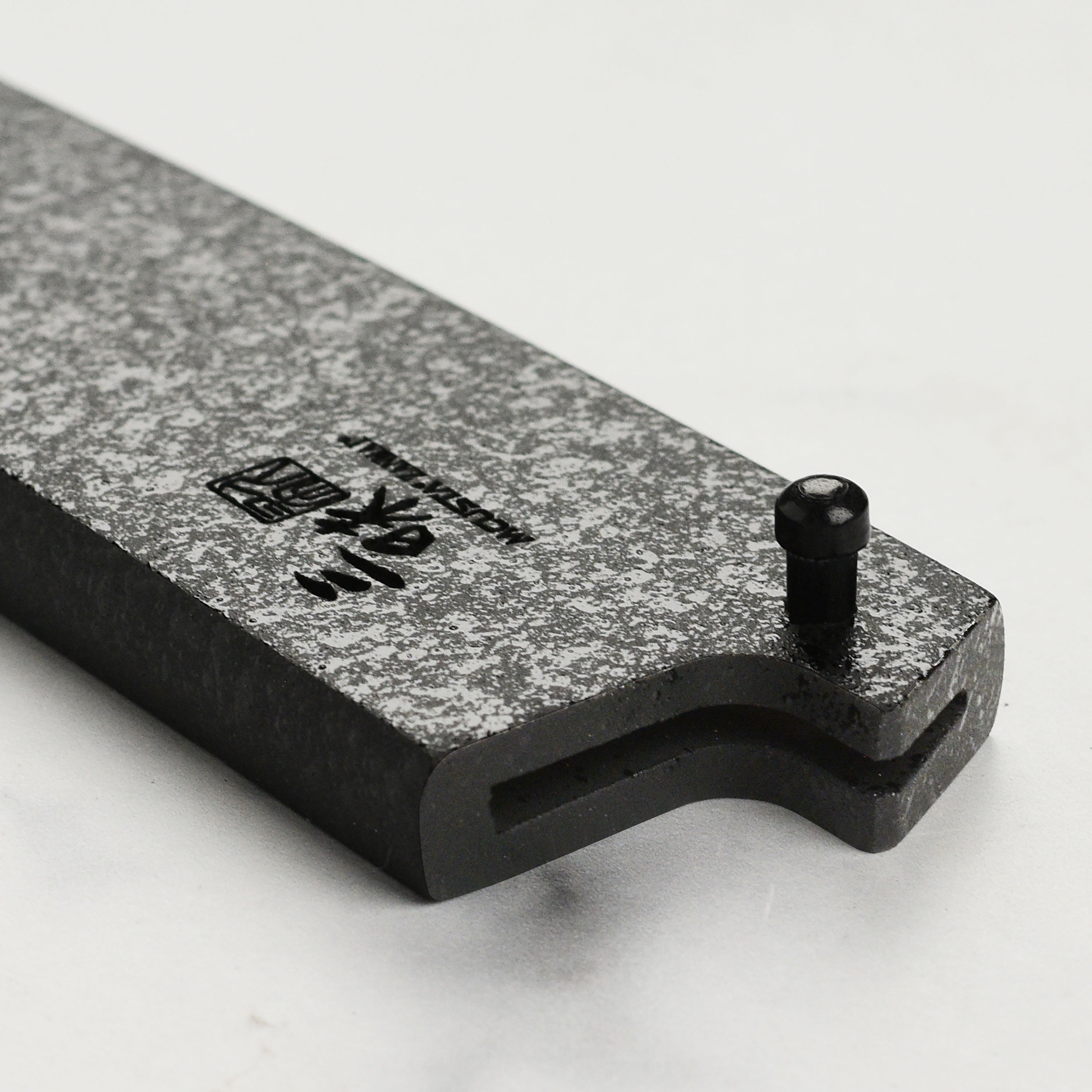 Display of the Japanese knife saya with a 5.9 inch petty knife securely stored.