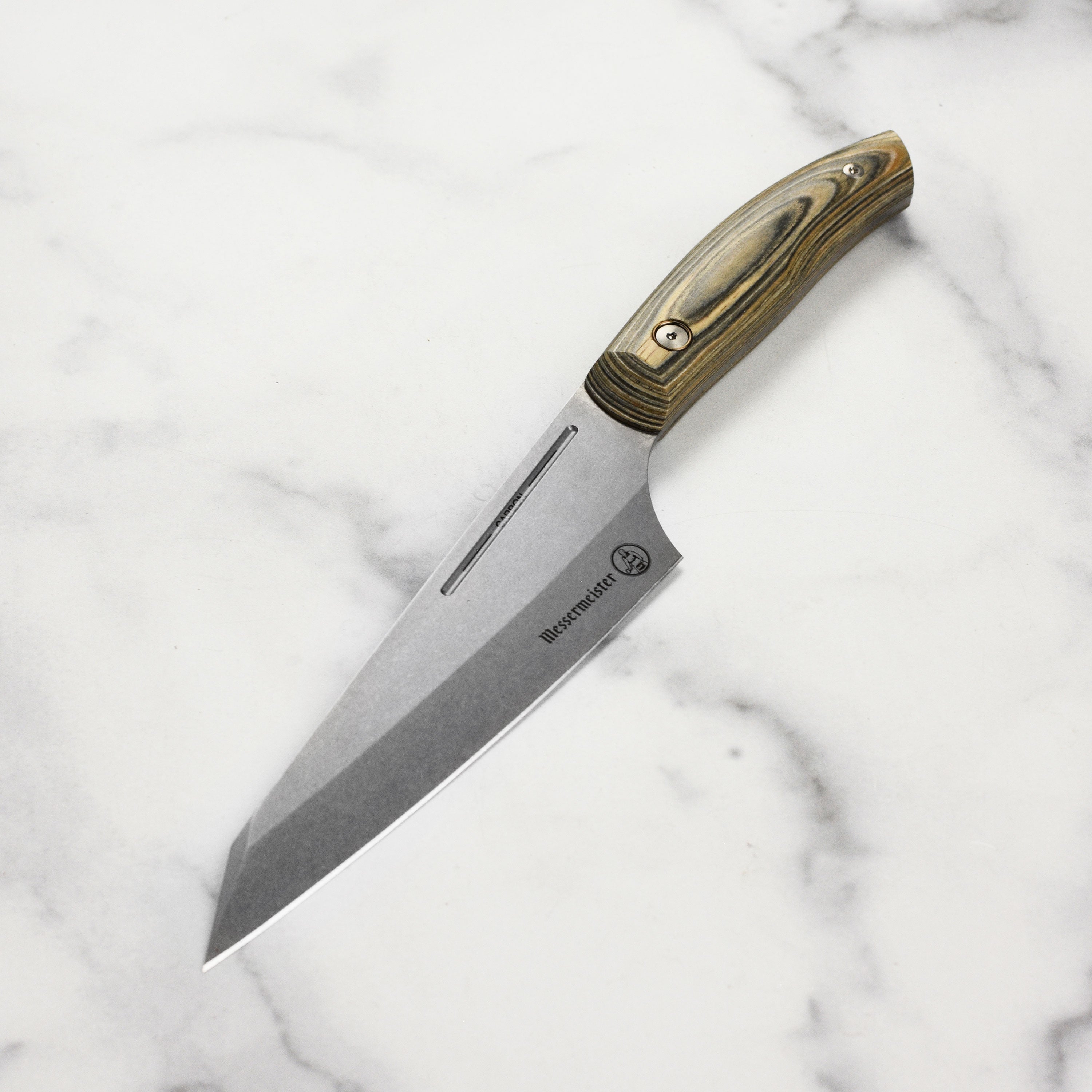 Close-up view of the Bohler K110 chef's knife showcasing the ceramic stonewash finish