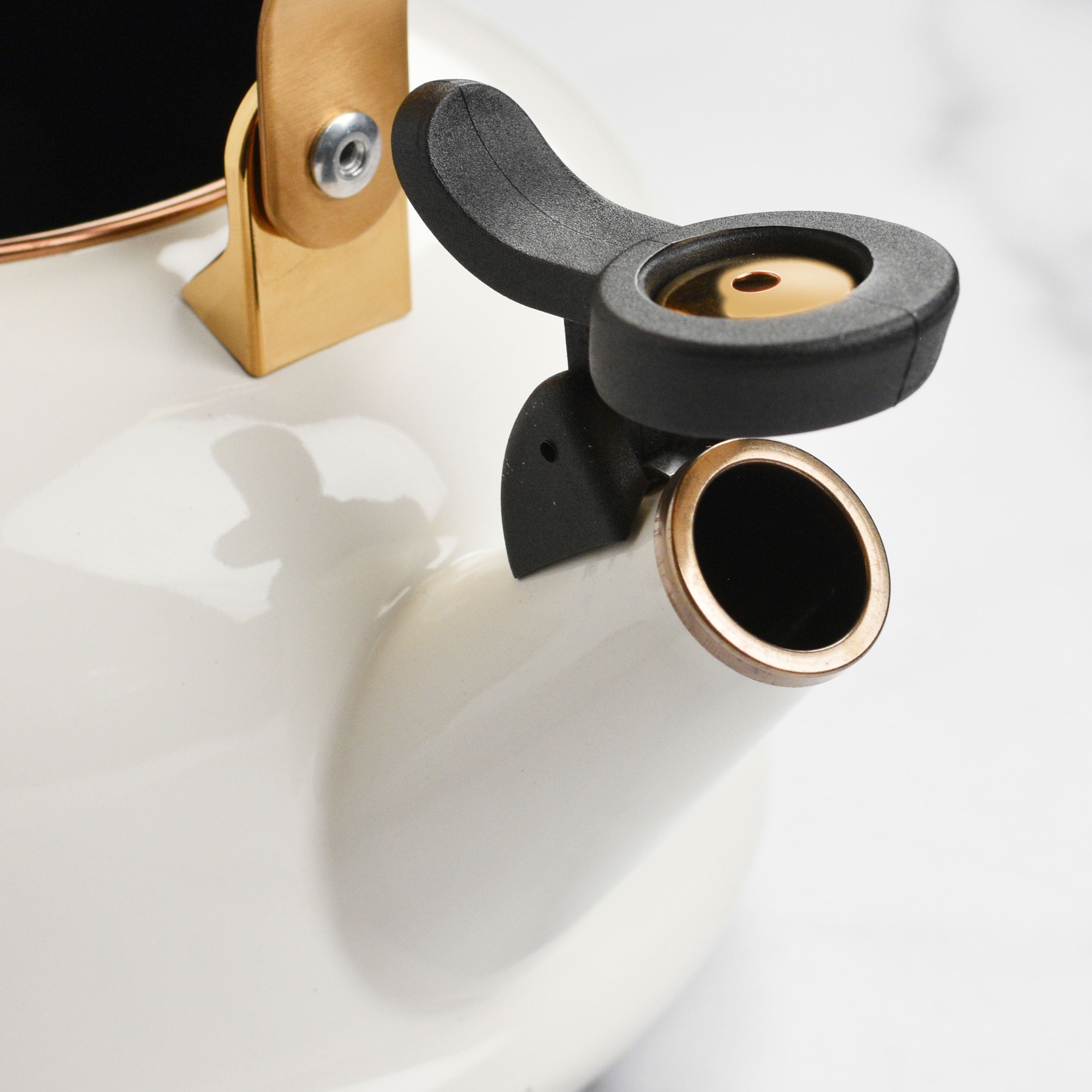 Le Creuset kettle with gold knob, showcasing its elegant design and vibrant color.