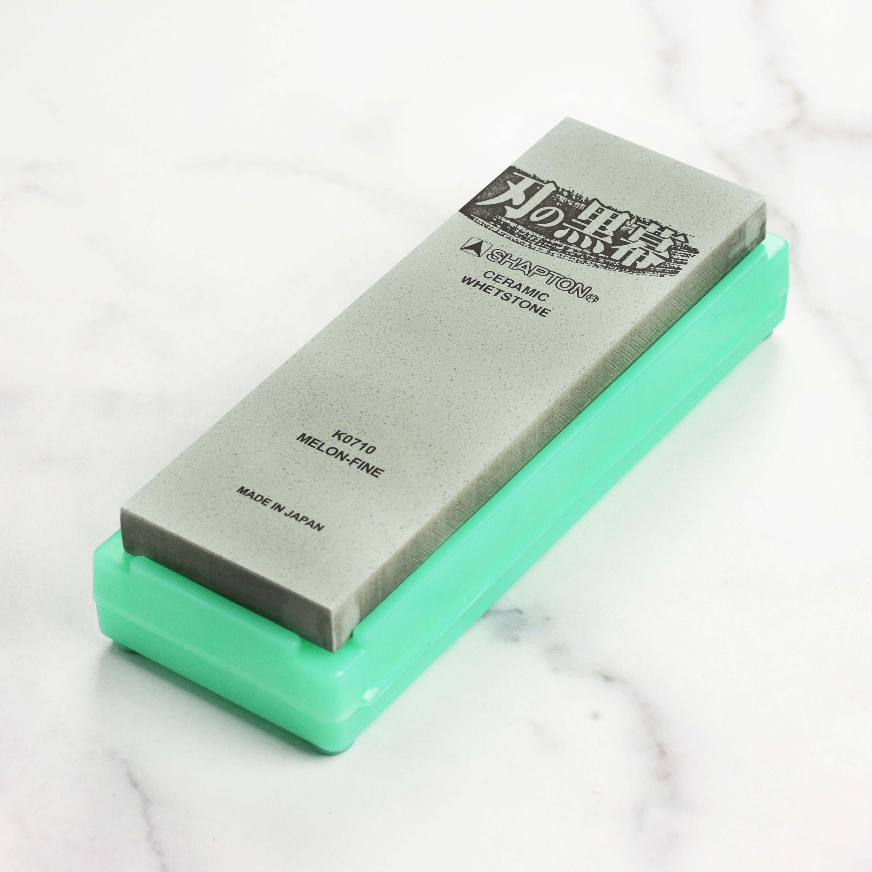Shapton Kuromaku 8,000 grit stone in its plastic case, ready for use in knife sharpening.