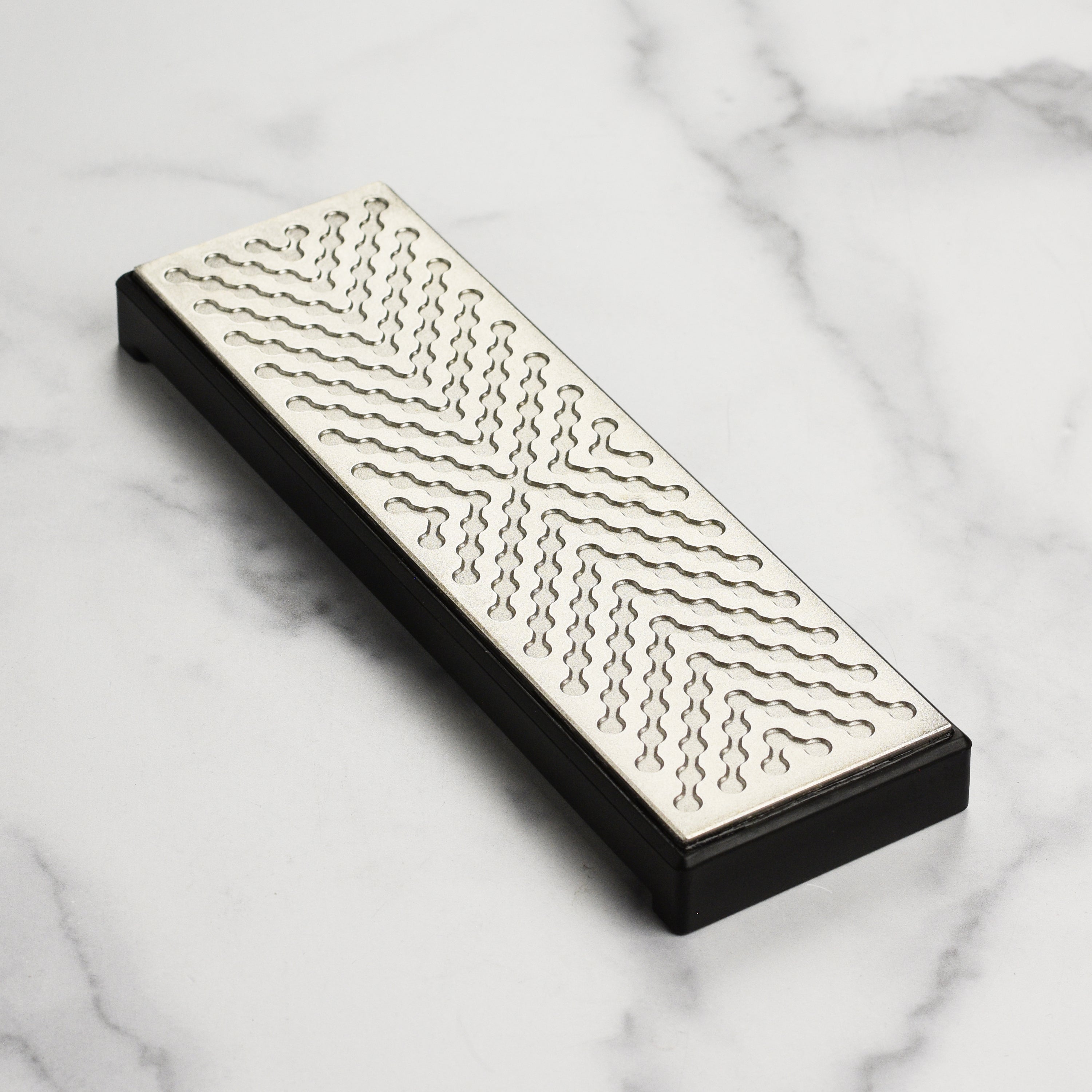 Shapton diamond lapping plate showing smooth surface for sharpening tools.