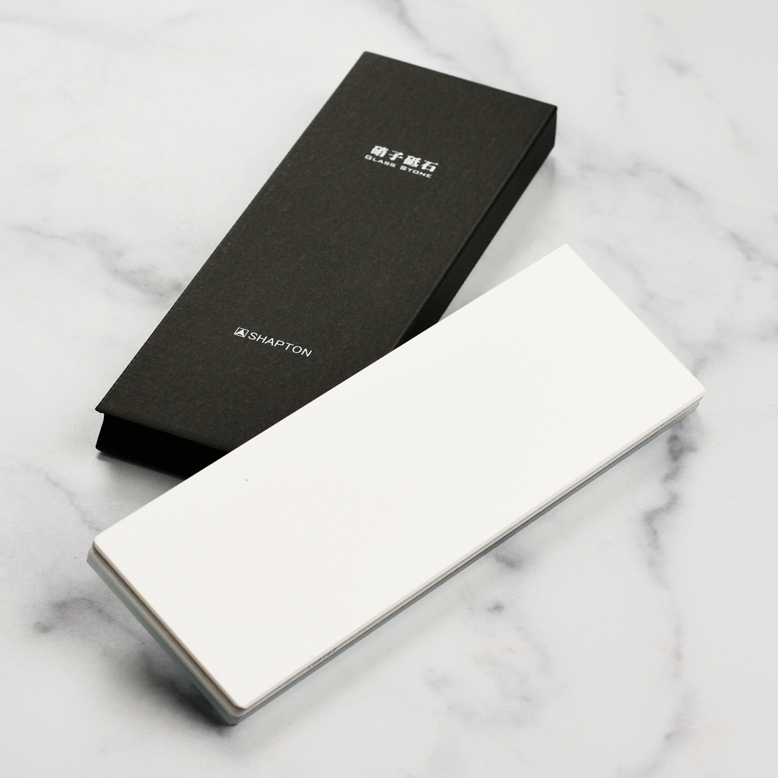 Close-up angle of Shapton 4000 grit sharpening stone surface texture for knife sharpening